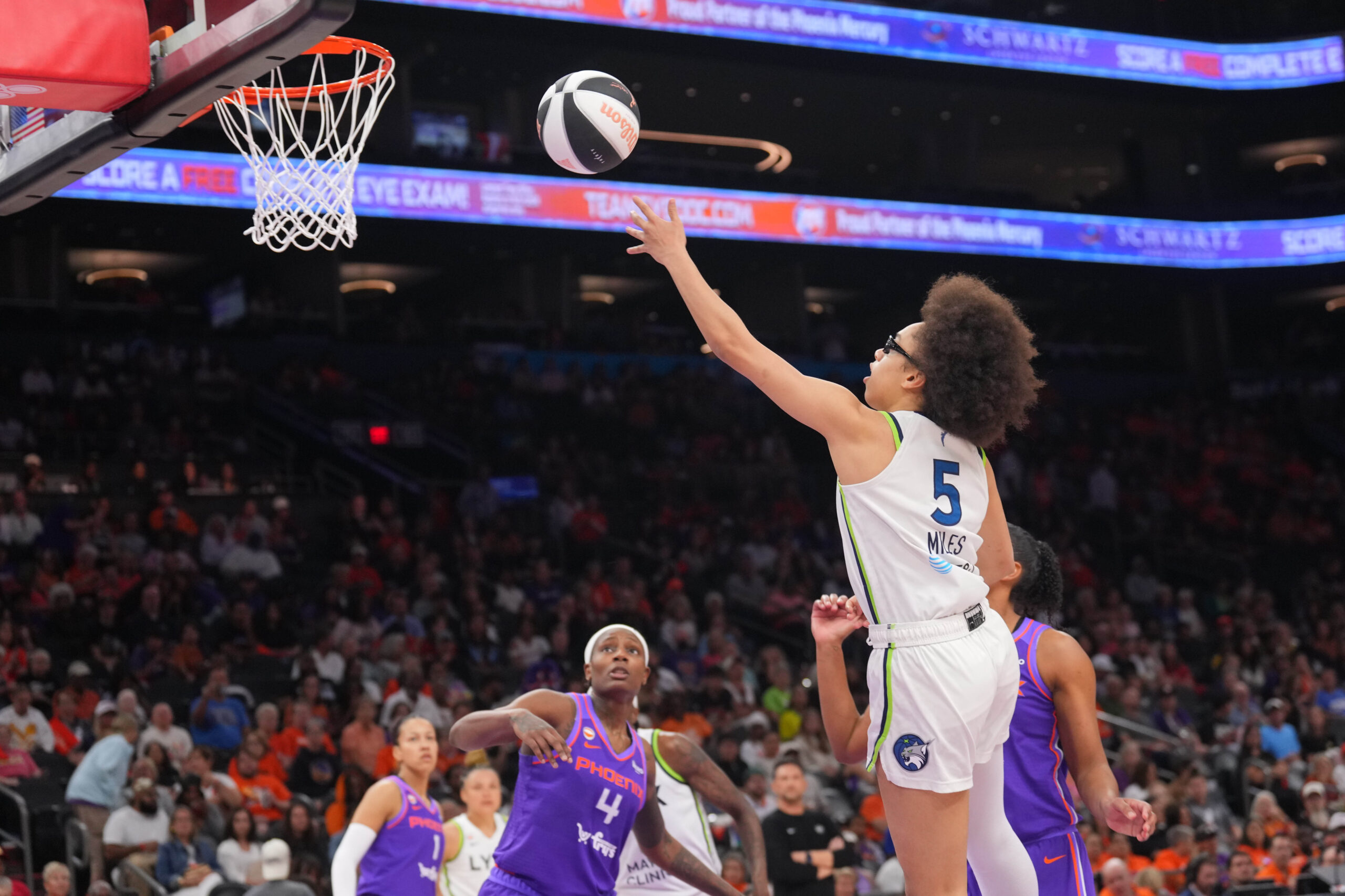 Jun 1, 2026; Phoenix, Arizona, USA; Minnesota Lynx guard Olivia Miles (5) shoots against the Phoenix Mercury during the second half at Mortgage Matchup Center. Mandatory Credit: Joe Camporeale-Imagn Images
