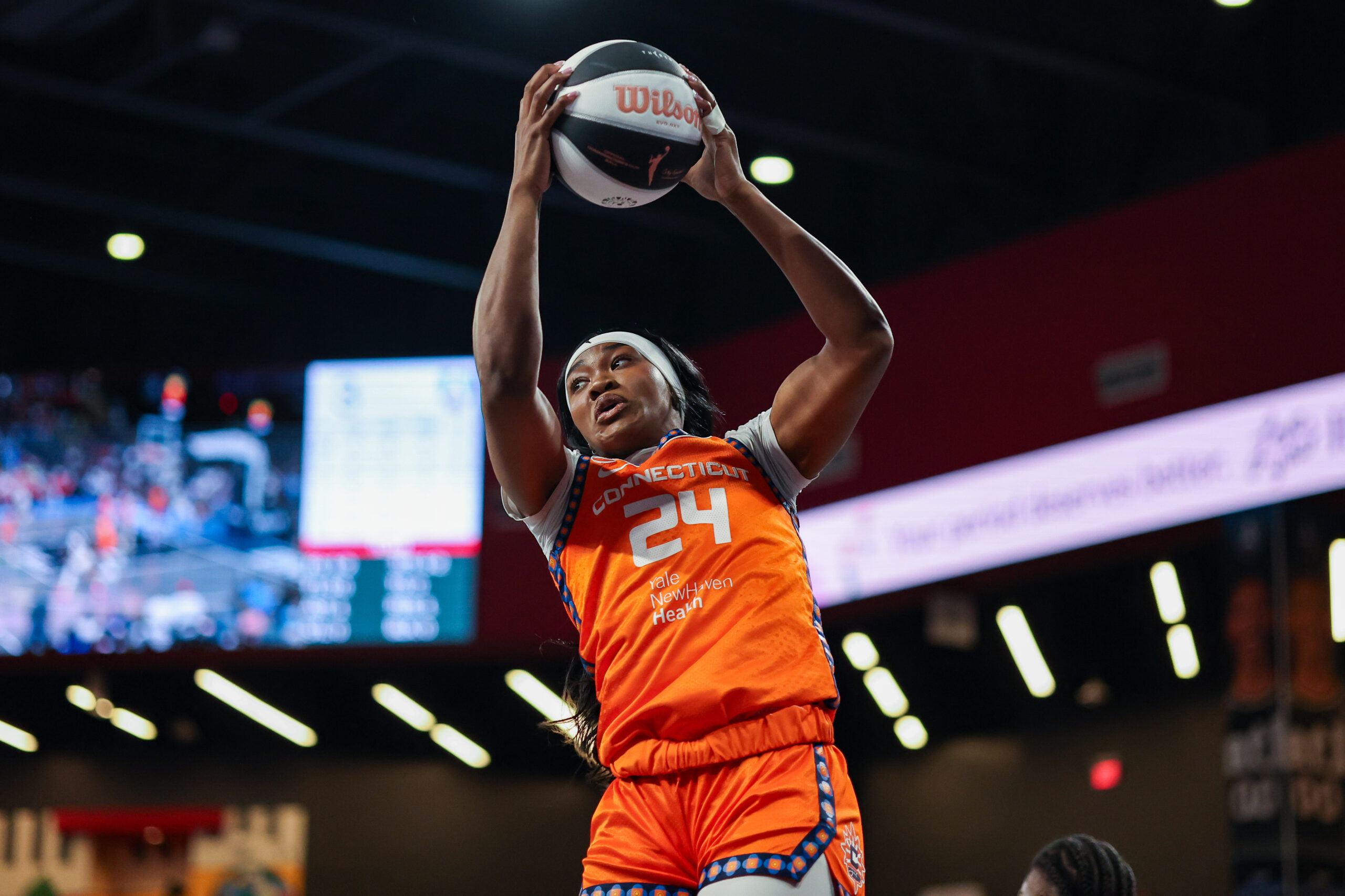 Jun 2, 2026; College Park, Georgia, USA; Connecticut Sun forward Aneesah Morrow (24) grabs a rebound against the Atlanta Dream in the first quarter at Gateway Center Arena at College Park. Mandatory Credit: Brett Davis-Imagn Images