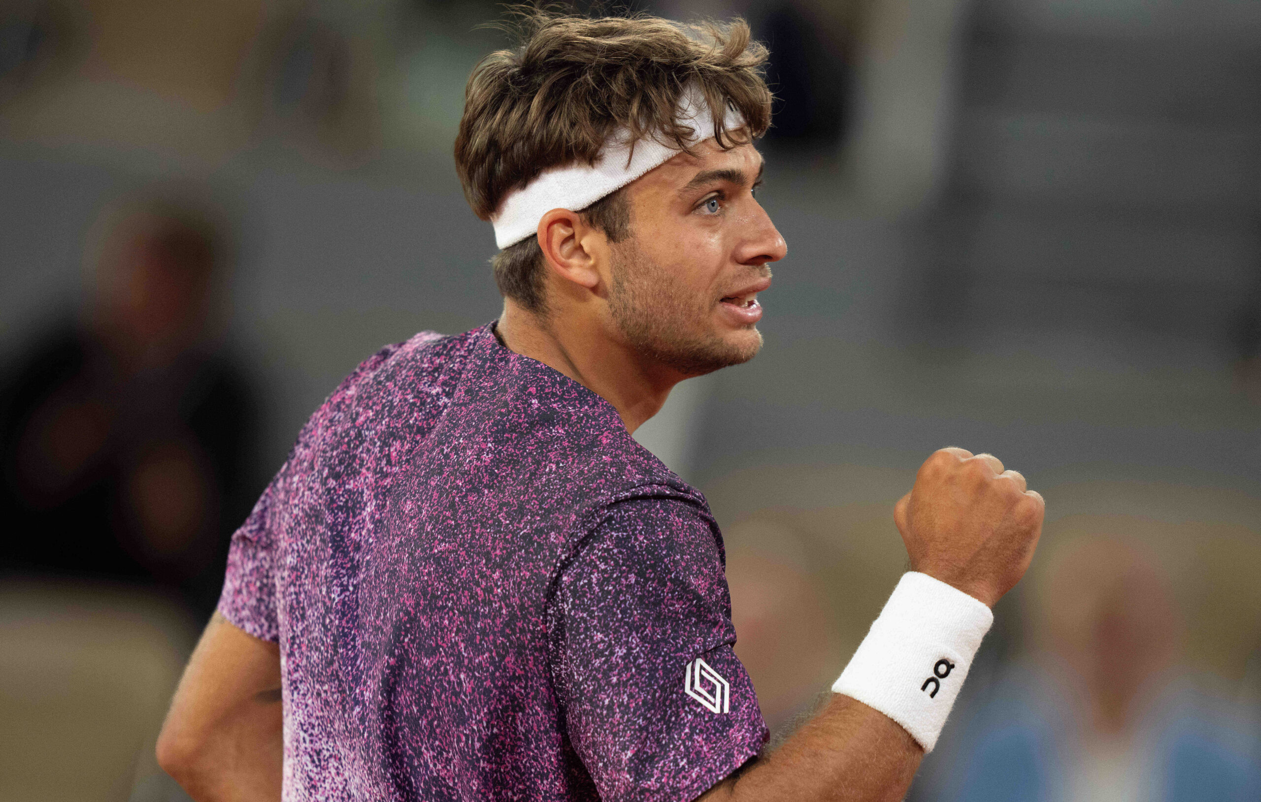 Jun 3, 2026; Paris, France; Flavio Cobolli of Italy reacts during his match against Felix Auger-Aliassime of Canada on day 11 at Stade Roland Garros. Mandatory Credit: Susan Mullane-Imagn Images