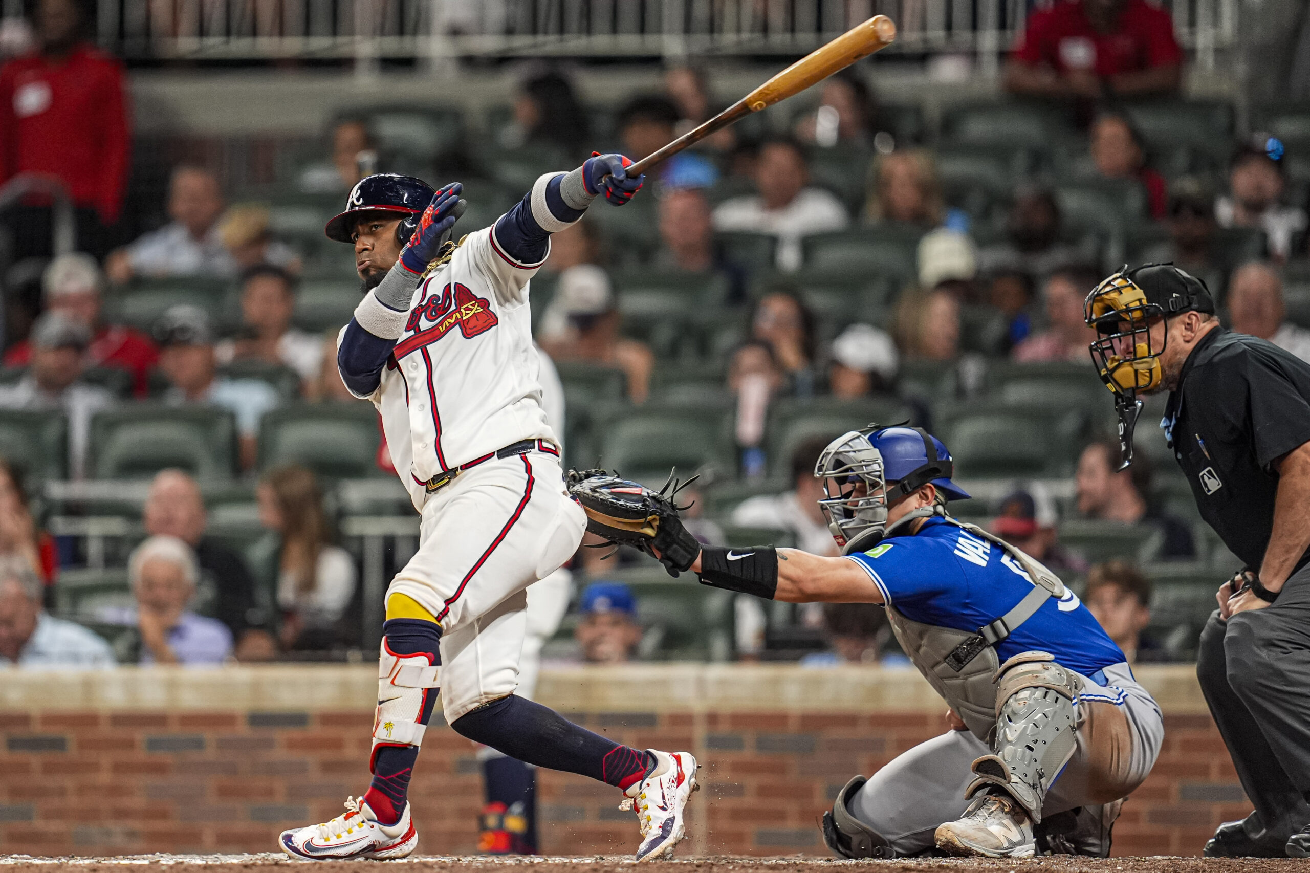 Jun 3, 2026; Cumberland, Georgia, USA; Atlanta Braves second baseman Ozzie Albies (1) hits a three run home run against the Toronto Blue Jays during the seventh inning at Truist Park. Mandatory Credit: Dale Zanine-Imagn Images
