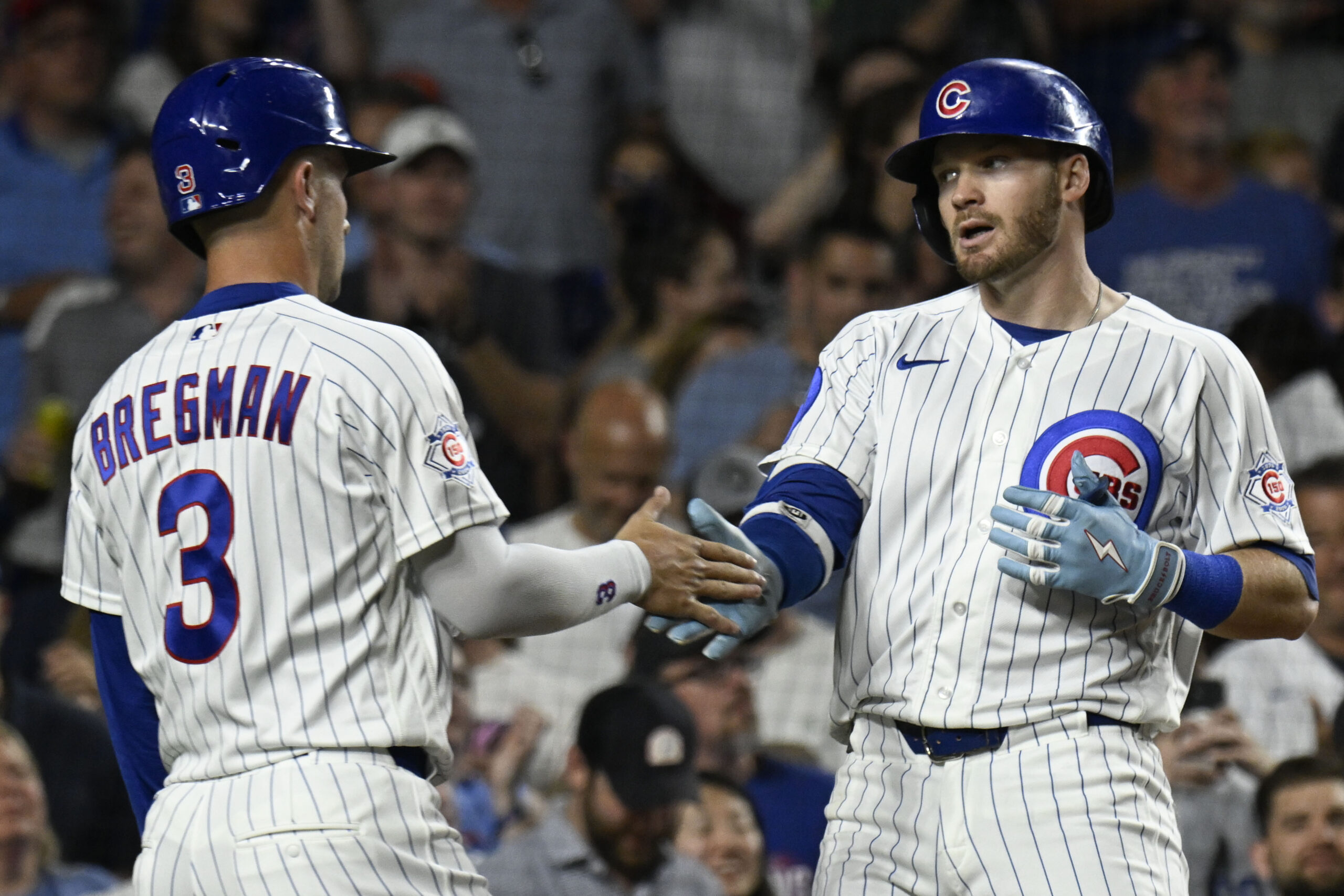 Jun 4, 2026; Chicago, Illinois, USA; Chicago Cubs left fielder Ian Happ (8) celebrates with third baseman Alex Bregman (3) after hitting a two run home run during the seventh inning against the Oakland Athletics at Wrigley Field. Mandatory Credit: Matt Marton-Imagn Images