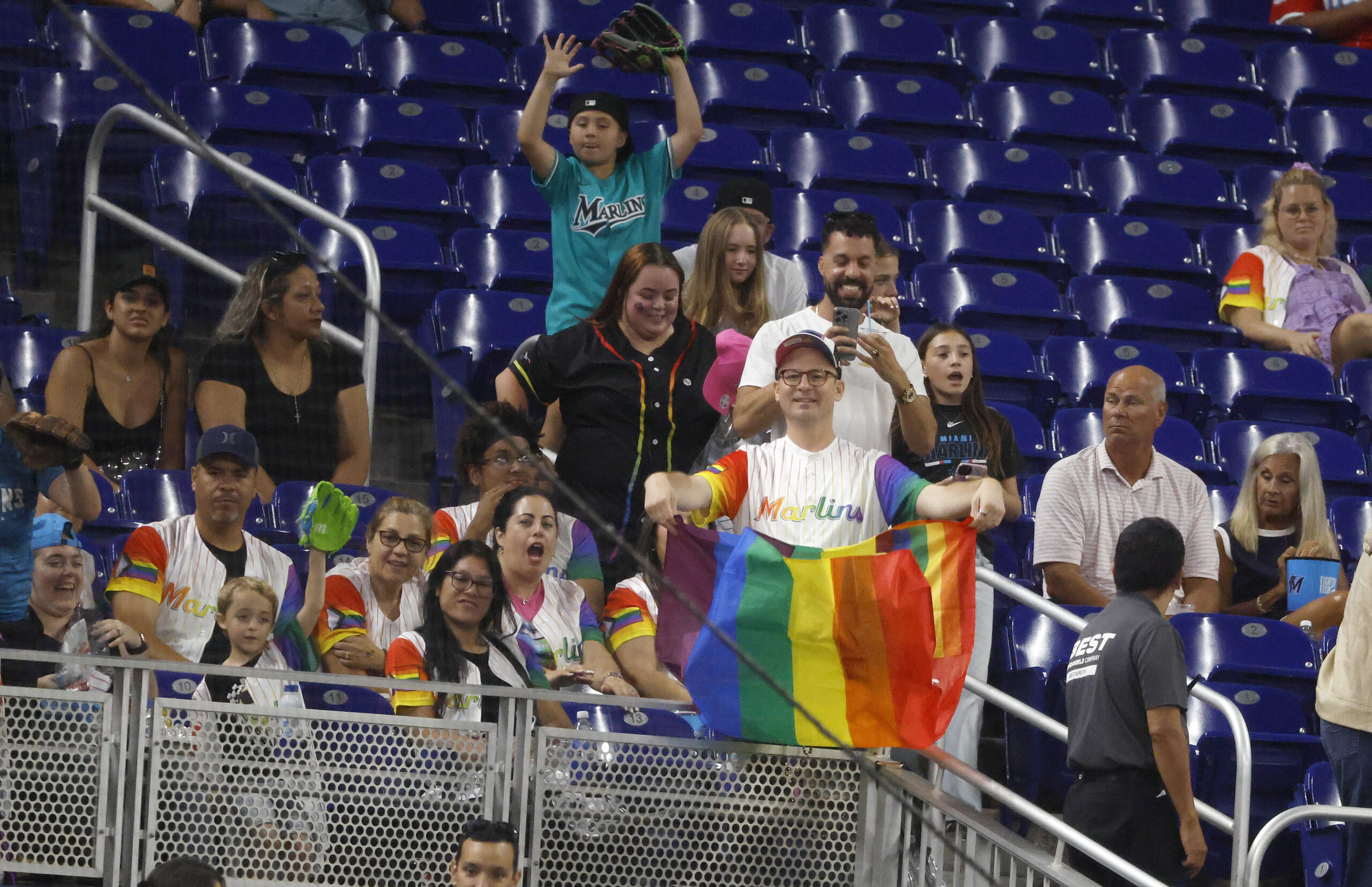 Jun 5, 2026; Miami, Florida, USA; Fans hold up a Pride Flag and cheer on MLB Pride Night between the Tampa Bay Rays against the Miami Marlins during the fourth inning at loanDepot Park. Mandatory Credit: Rhona Wise-Imagn Images