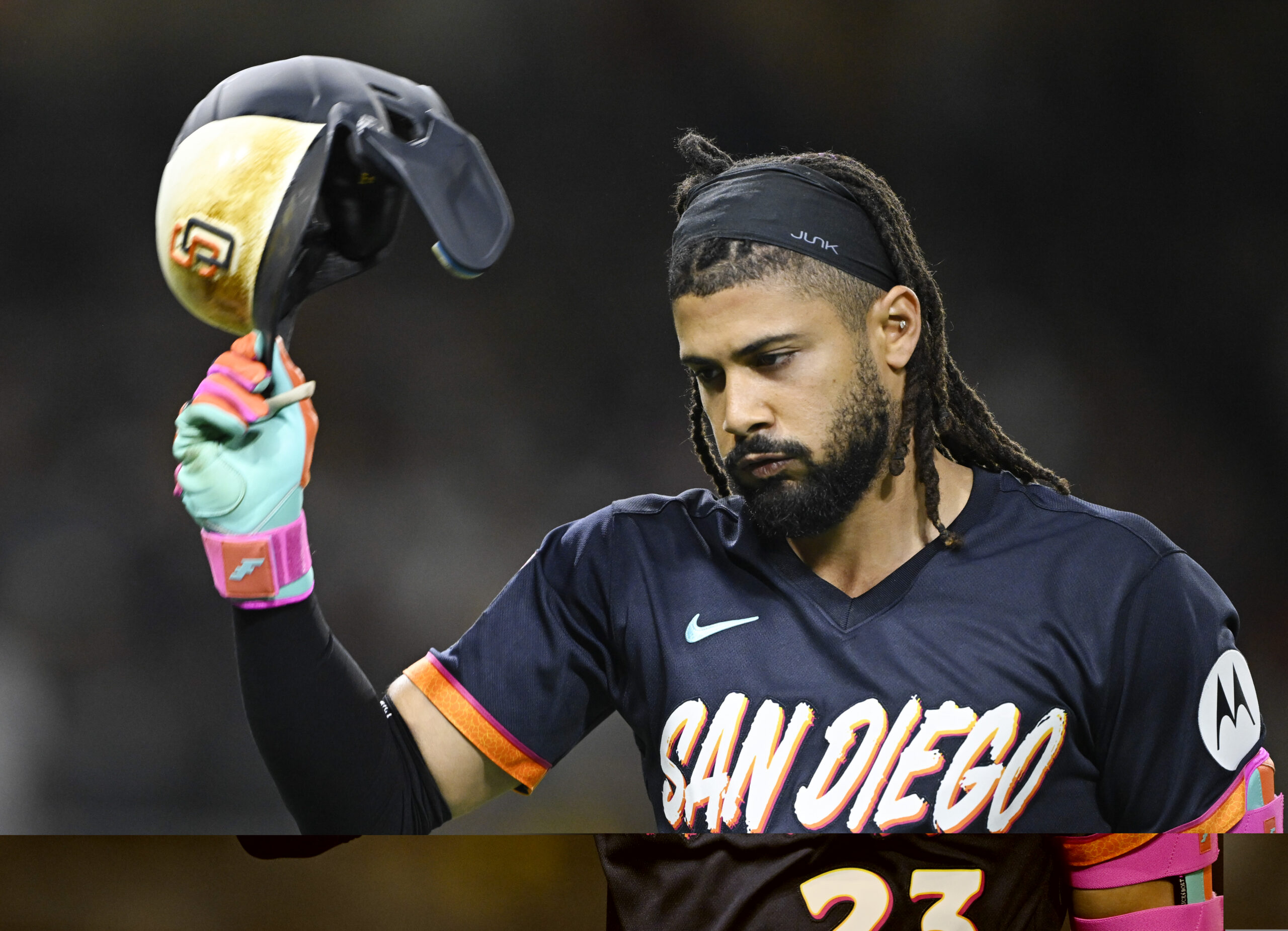Jun 5, 2026; San Diego, California, USA; San Diego Padres right fielder Fernando Tatis Jr. (23) throws his helmet after lining out during the eighth inning against the New York Mets at Petco Park. Mandatory Credit: Denis Poroy-Imagn Images