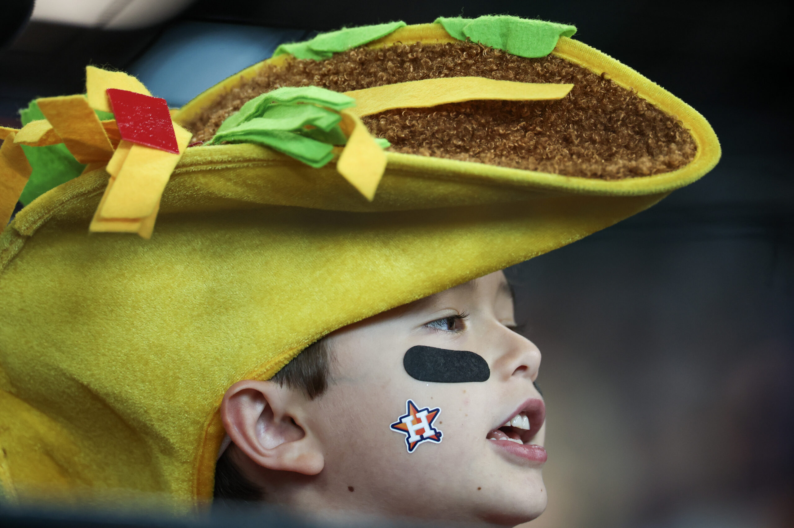 Jun 6, 2026; Houston, Texas, USA;  William Whitley , age 7 from Houston watches the Athletics bat against the Houston Astros in the seventh inning at Daikin Park. Mandatory Credit: Thomas Shea-Imagn Images