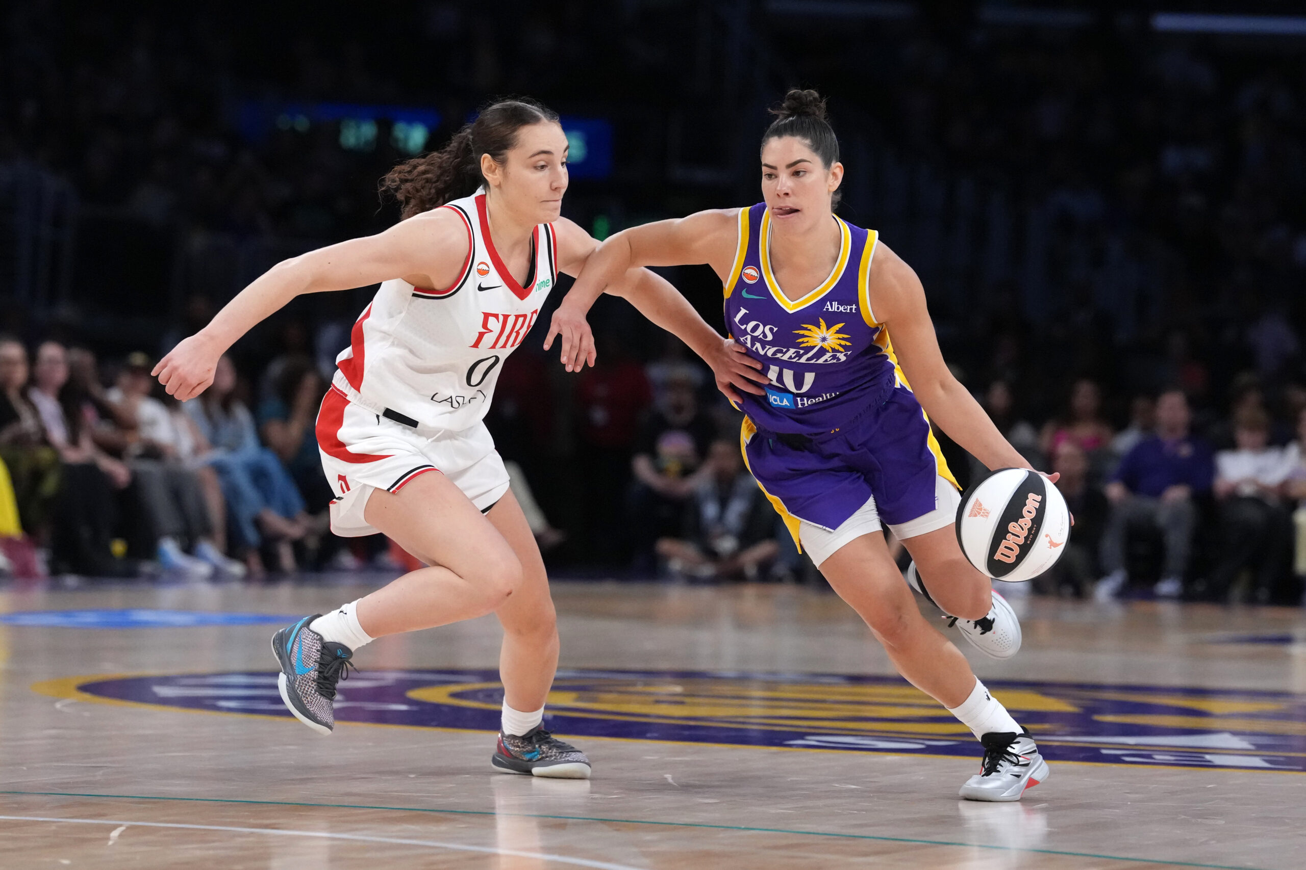 Jun 7, 2026; Los Angeles, California, USA; LA Sparks guard Kelsey Plum (10) drives to the basket against Portland Fire guard Carla Leite (0) in the second half at Crypto.com Arena. Mandatory Credit: Kirby Lee-Imagn Images