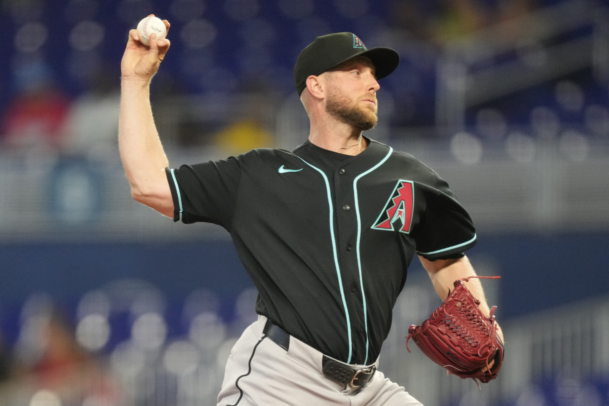 Jun 11, 2026; Miami, Florida, USA; Arizona Diamondbacks pitcher Merrill Kelly (29) throws in the first inning against the Miami Marlins at loanDepot Park. Mandatory Credit: Jim Rassol-Imagn Images