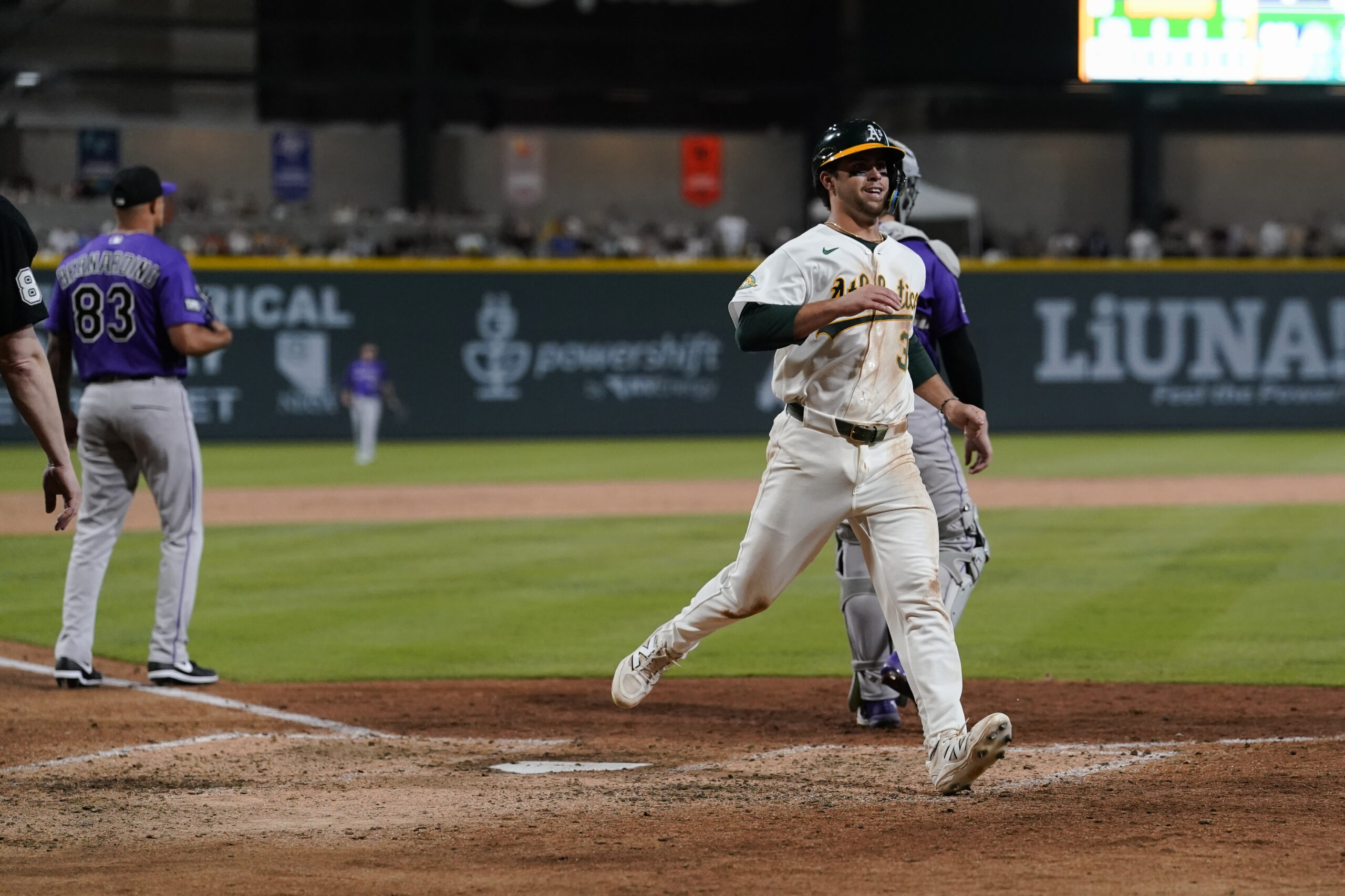 Jun 12, 2026; Summerlin, Nevada, USA; Athletics third baseman Max Muncy (3) scores during the eighth inning against the Colorado Rockies at the Las Vegas Ballpark. Mandatory Credit: Lucas Peltier-Imagn Images
