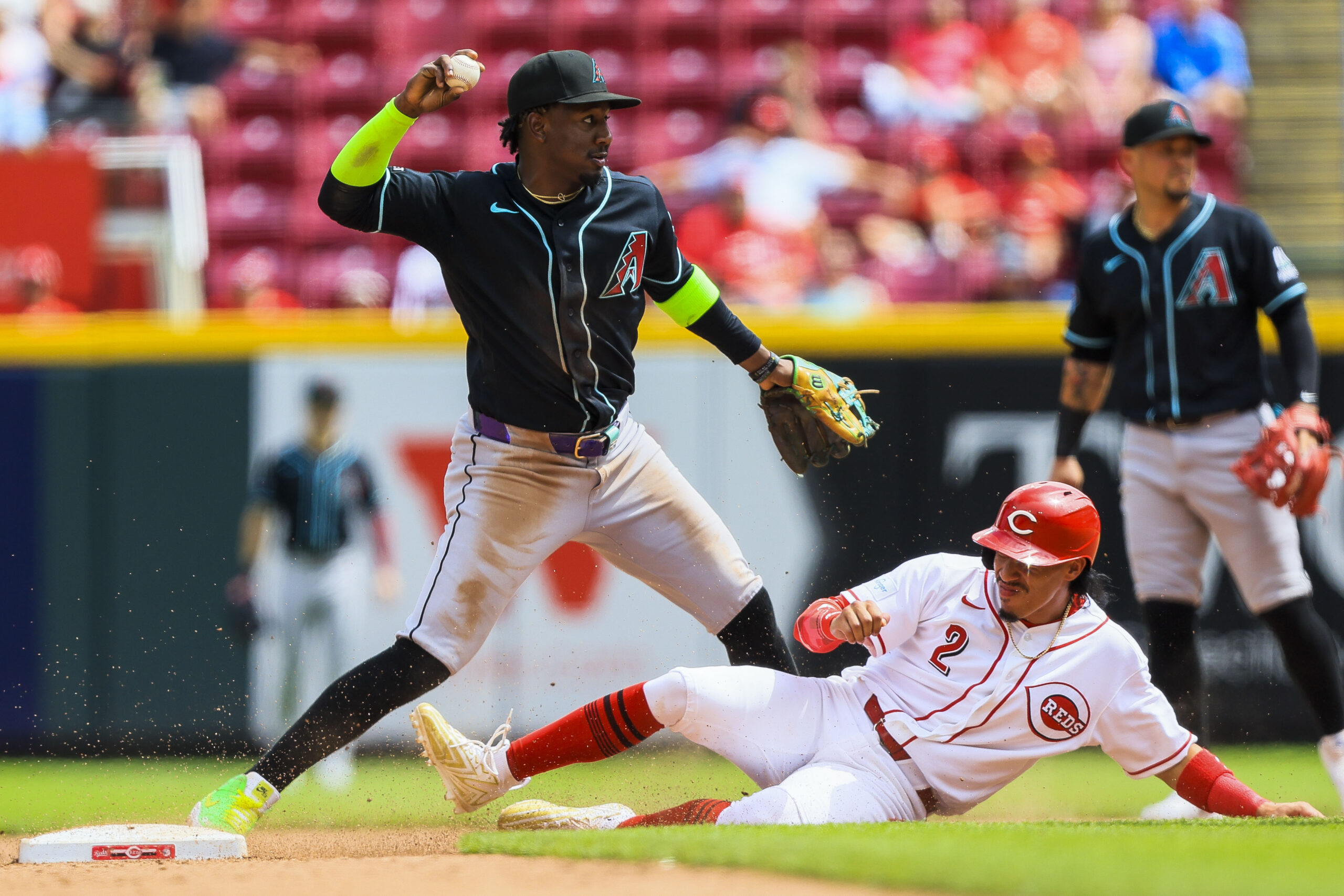 Jun 14, 2026; Cincinnati, Ohio, USA; Arizona Diamondbacks shortstop Geraldo Perdomo (2) throws to first to get Cincinnati Reds outfielder Blake Dunn (not pictured) out to complete the double play in the seventh inning at Great American Ball Park. Mandatory Credit: Katie Stratman-Imagn Images