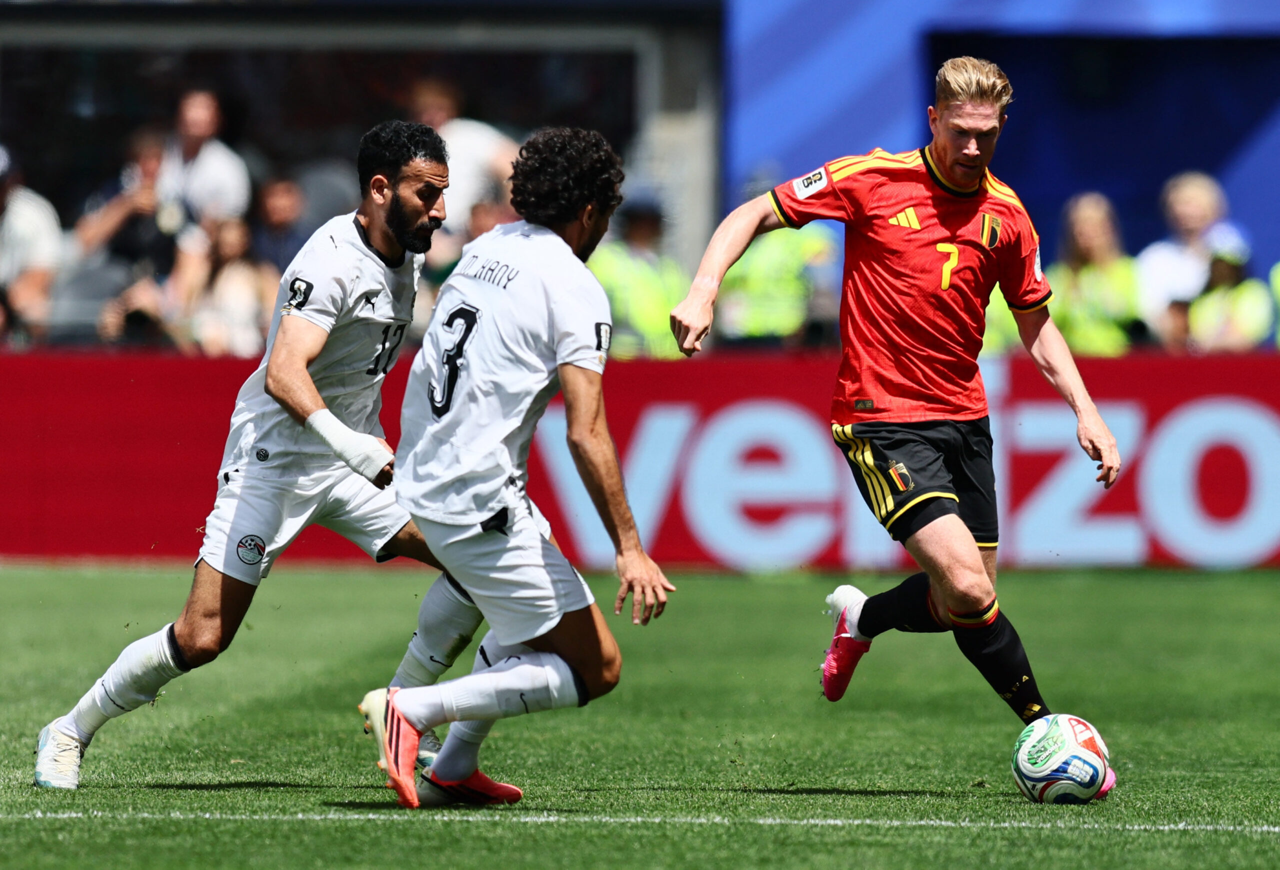 June 15, 2026; Seattle, Washington, U.S.; Belgium's Kevin De Bruyne in action with Egypt's Mohamed Hany and Mohanad Lashin.  Mandatory Credit: Blake Dahlin-Imagn Images