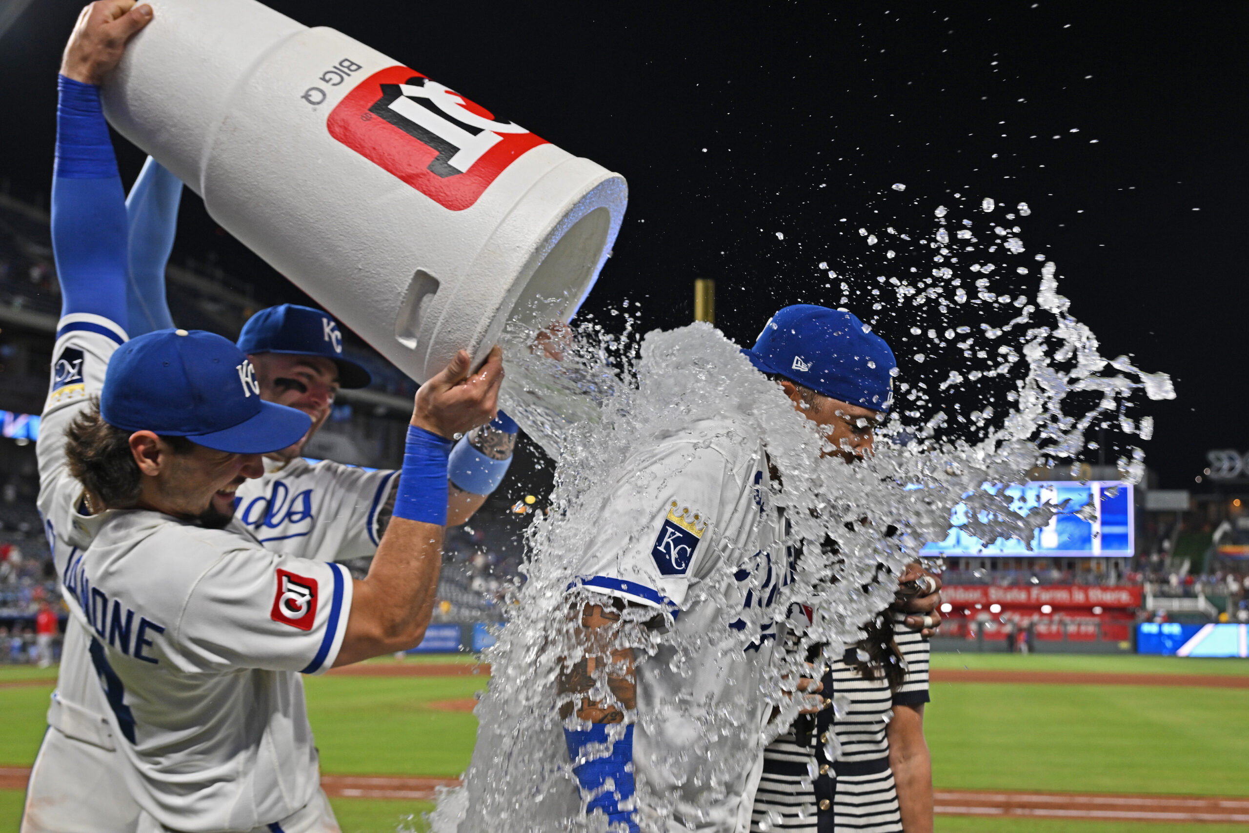 Jun 18, 2026; Kansas City, Missouri, USA;  Kansas City Royals catcher Salvador Perez (13) gets a victory dunk from first baseman Jac Caglianone (14) and designated hitter Carter Jensen (22) after defeating the St. Louis Cardinals at Kauffman Stadium. Mandatory Credit: Peter Aiken-Imagn Images