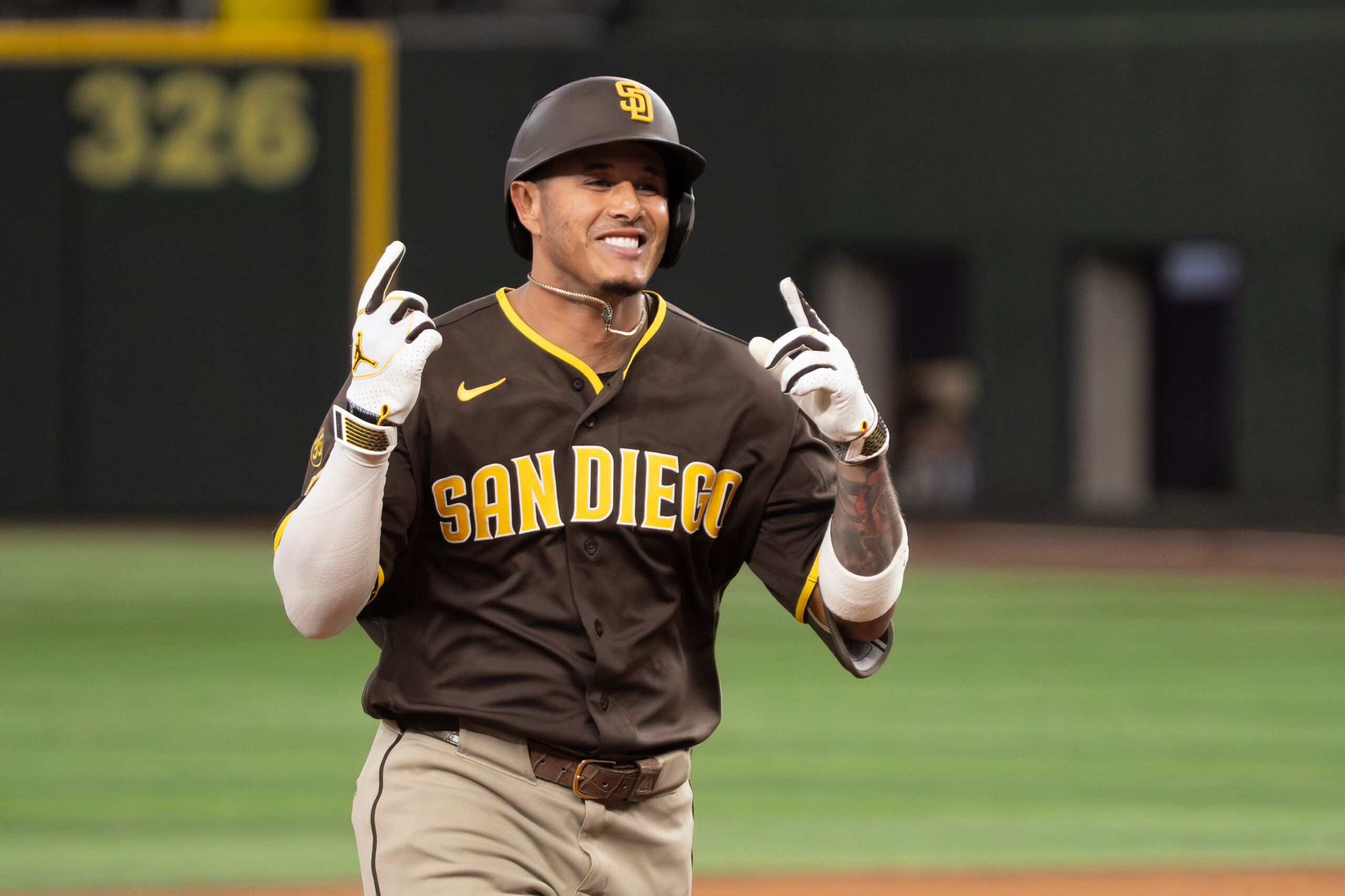 Jun 20, 2026; Arlington, Texas, USA;  San Diego Padres third baseman Manny Machado (13) circles the bases after hitting a three-run home run against the Texas Rangers during the tenth inning at Globe Life Field. Mandatory Credit: Raymond Carlin III-Imagn Images