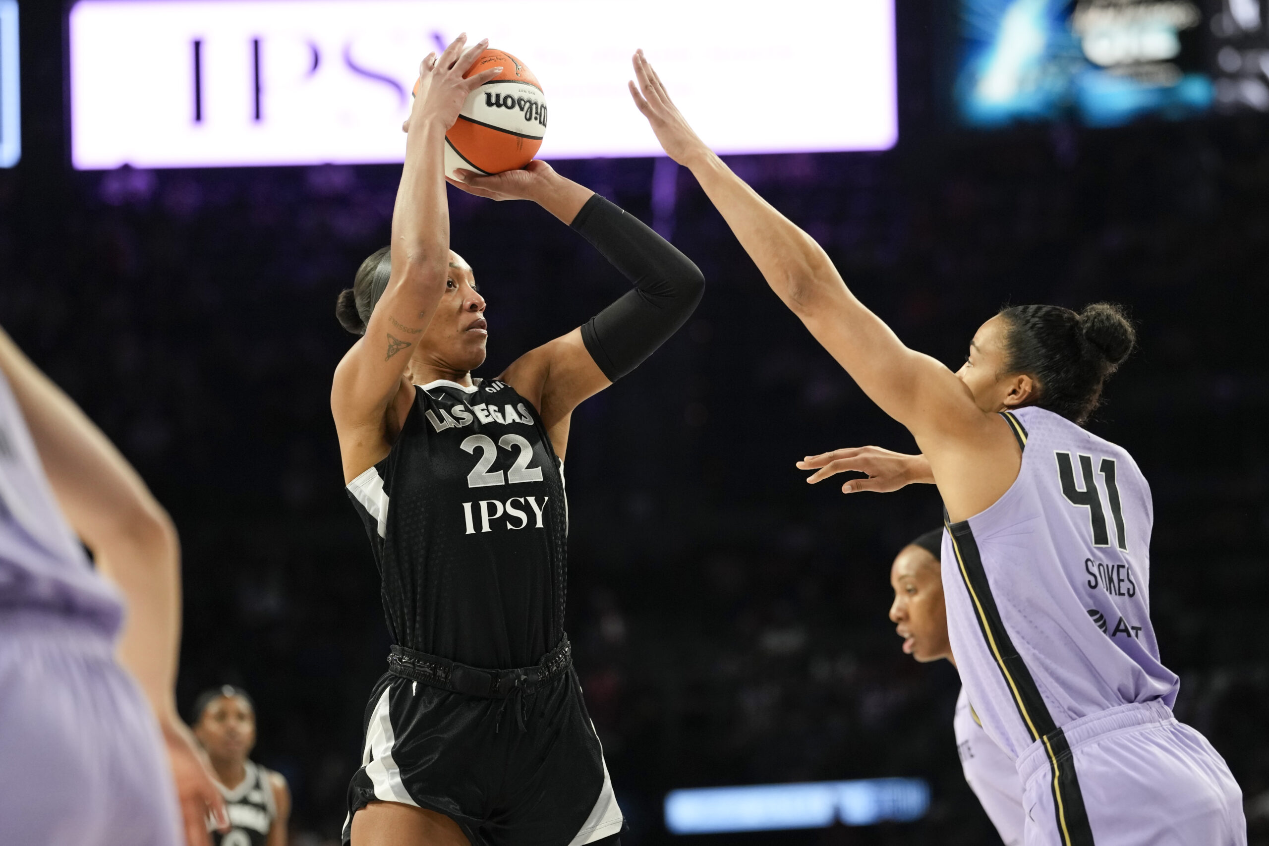 Jun 21, 2026; Las Vegas, Nevada, USA; Las Vegas Aces center A'ja Wilson (22) shoots the ball against Golden State Valkyries center Kiah Stokes (41) during the first quarter of a WNBA basketball game at Michelob Ultra Arena. Mandatory Credit: Lucas Peltier-Imagn Images