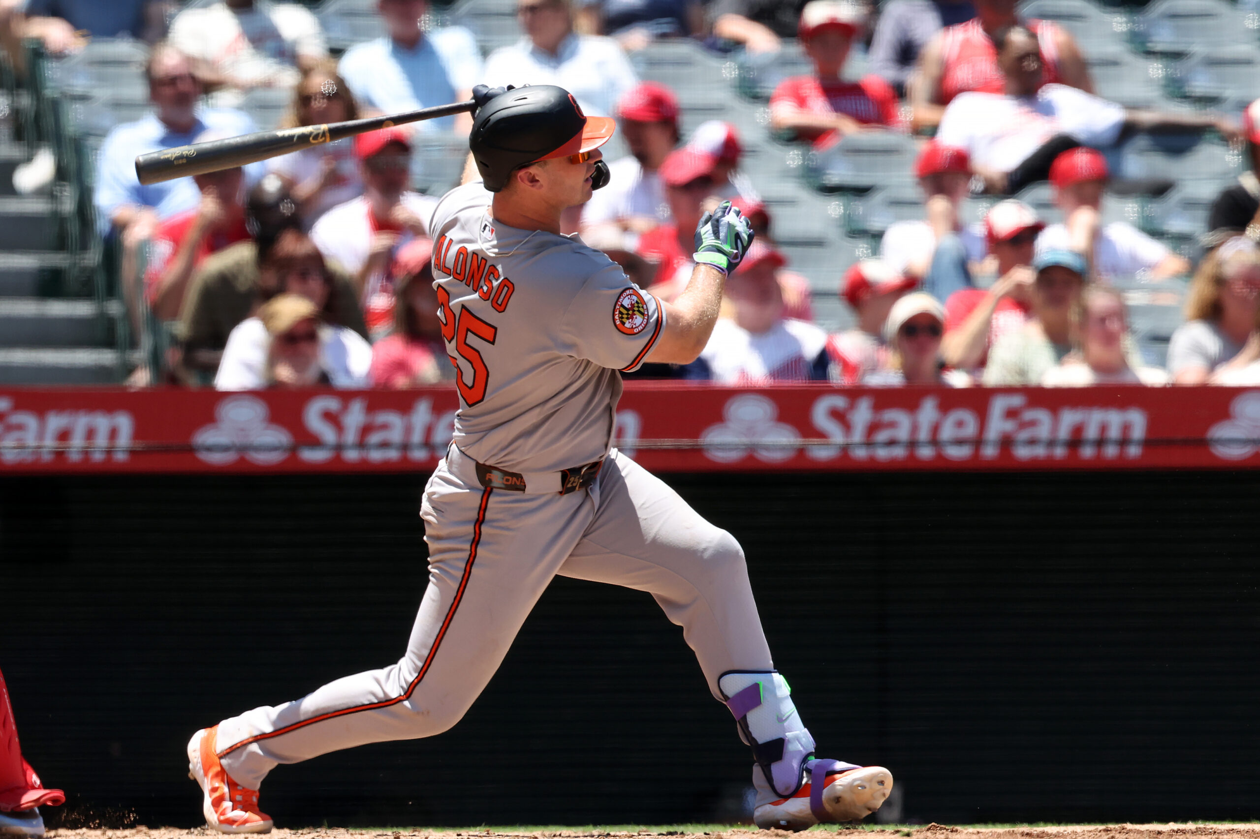 Jun 24, 2026; Anaheim, California, USA;  Baltimore Orioles first baseman Pete Alonso (25) hits an RBI double during the third inning against the Los Angeles Angels at Angel Stadium. Mandatory Credit: Kiyoshi Mio-Imagn Images