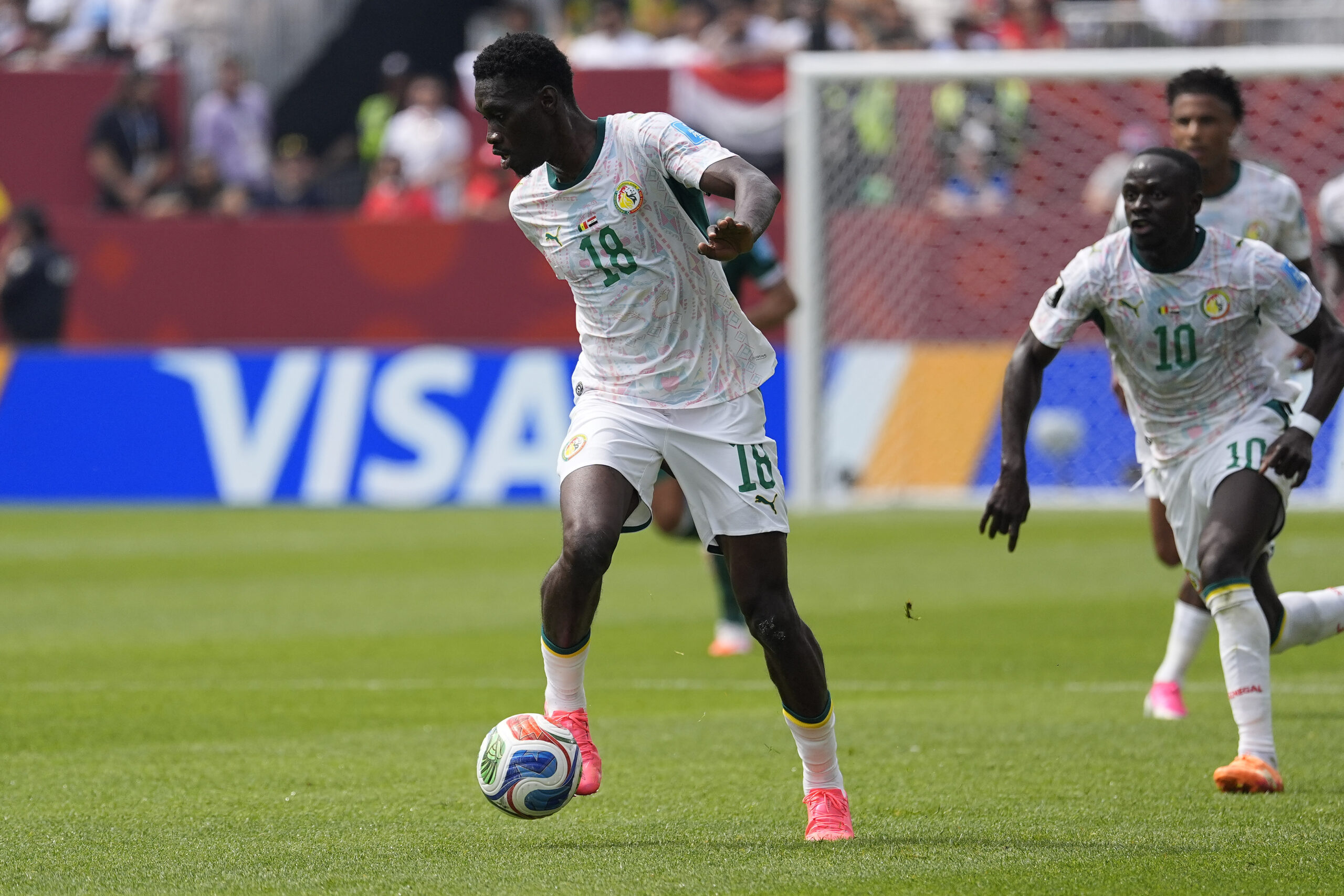 Jun 26, 2026; Toronto, Ontario, CAN; Senegal forward Ismaïla Sarr (18) dribbles the ball against Iraq during a Group I match in the 2026 FIFA World Cup at Toronto Stadium. Mandatory Credit: John E. Sokolowski-Imagn Images