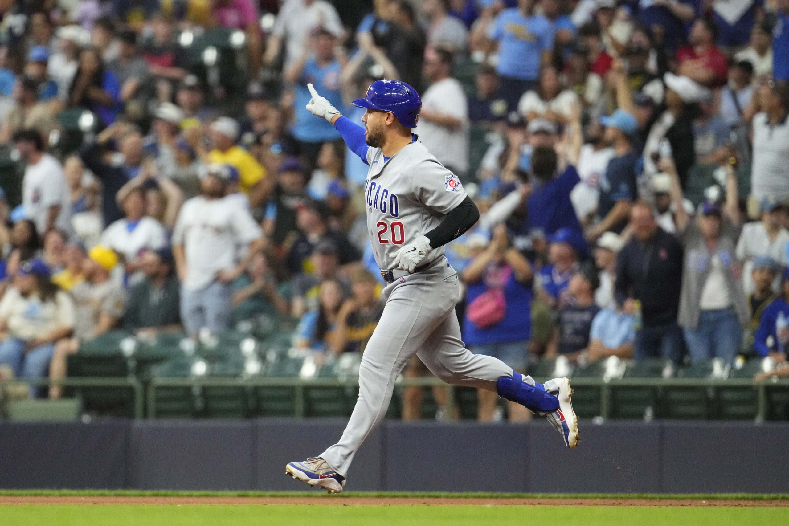 Jun 27, 2026; Milwaukee, Wisconsin, USA; Chicago Cubs left fielder Michael Conforto (20) rounds the bases after hitting a home run against the Milwaukee Brewers in the ninth inning at American Family Field. Mandatory Credit: Michael McLoone-Imagn Images
