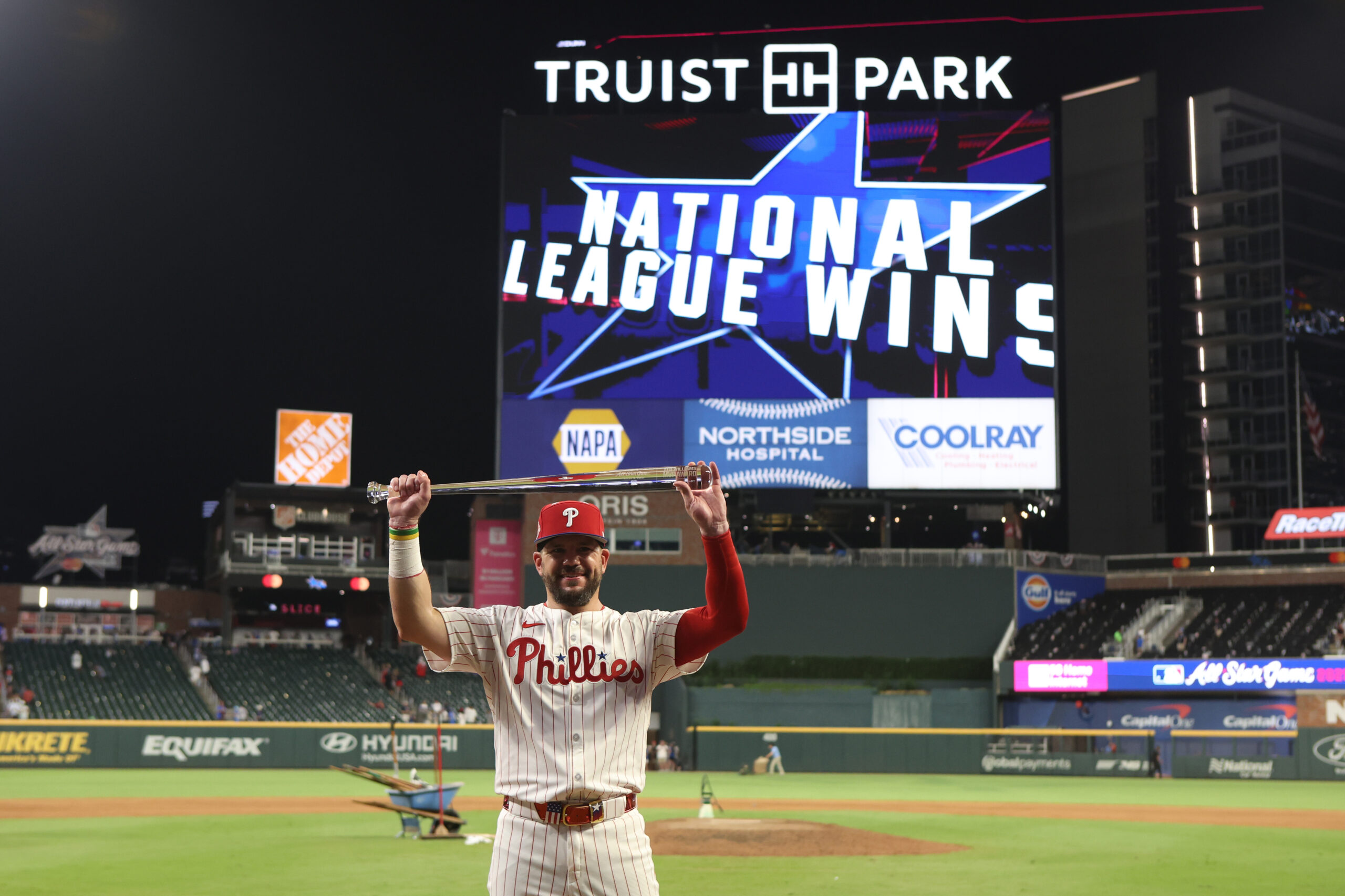 Jul 15, 2025; Cumberland, Georgia, USA; National League designated hitter Kyle Schwarber (12) of the Philadelphia Phillies celebrates after defeating the American League in the 2025 MLB All Star Game at Truist Park. Mandatory Credit: Brett Davis-Imagn Images