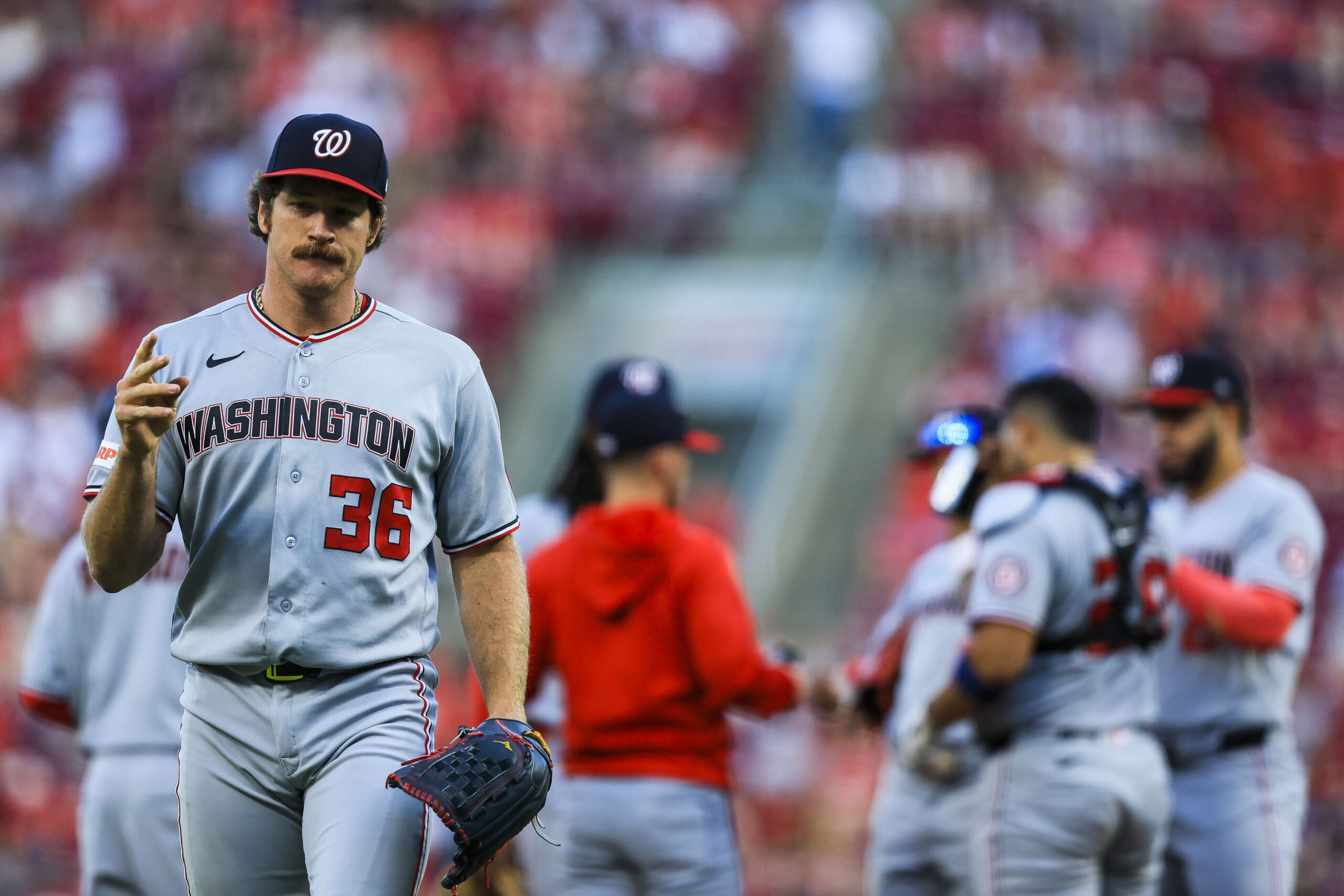 May 12, 2026; Cincinnati, Ohio, USA; Washington Nationals starting pitcher Miles Mikolas (36) walks off the field during a pitching change in the fourth inning against the Cincinnati Reds at Great American Ball Park. Mandatory Credit: Katie Stratman-Imagn Images