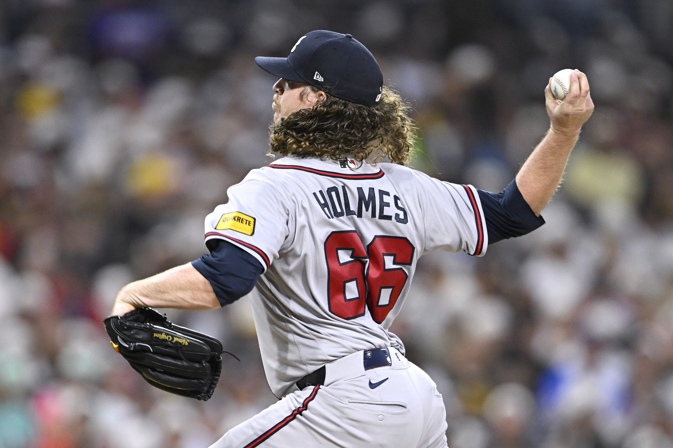 Jun 22, 2026; San Diego, California, USA; Atlanta Braves pitcher Grant Holmes (66) delivers during the fourth inning against the San Diego Padres at Petco Park. Mandatory Credit: Denis Poroy-Imagn Images