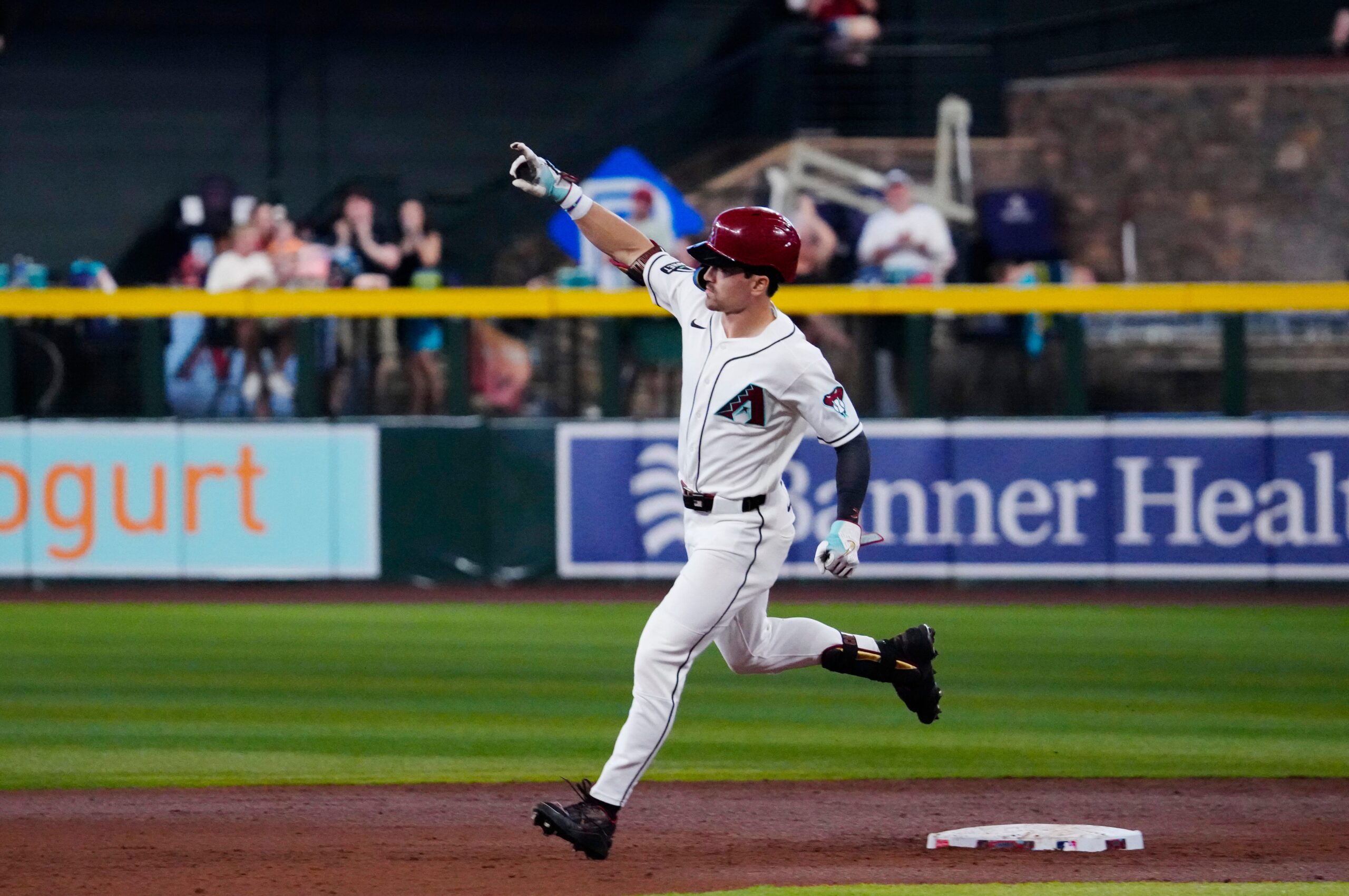 Diamondbacks outfielder Corbin Carroll (7) rounds second after hitting a grand-slam against the Angels during a game at Chase Field in Phoenix on June 17, 2026.