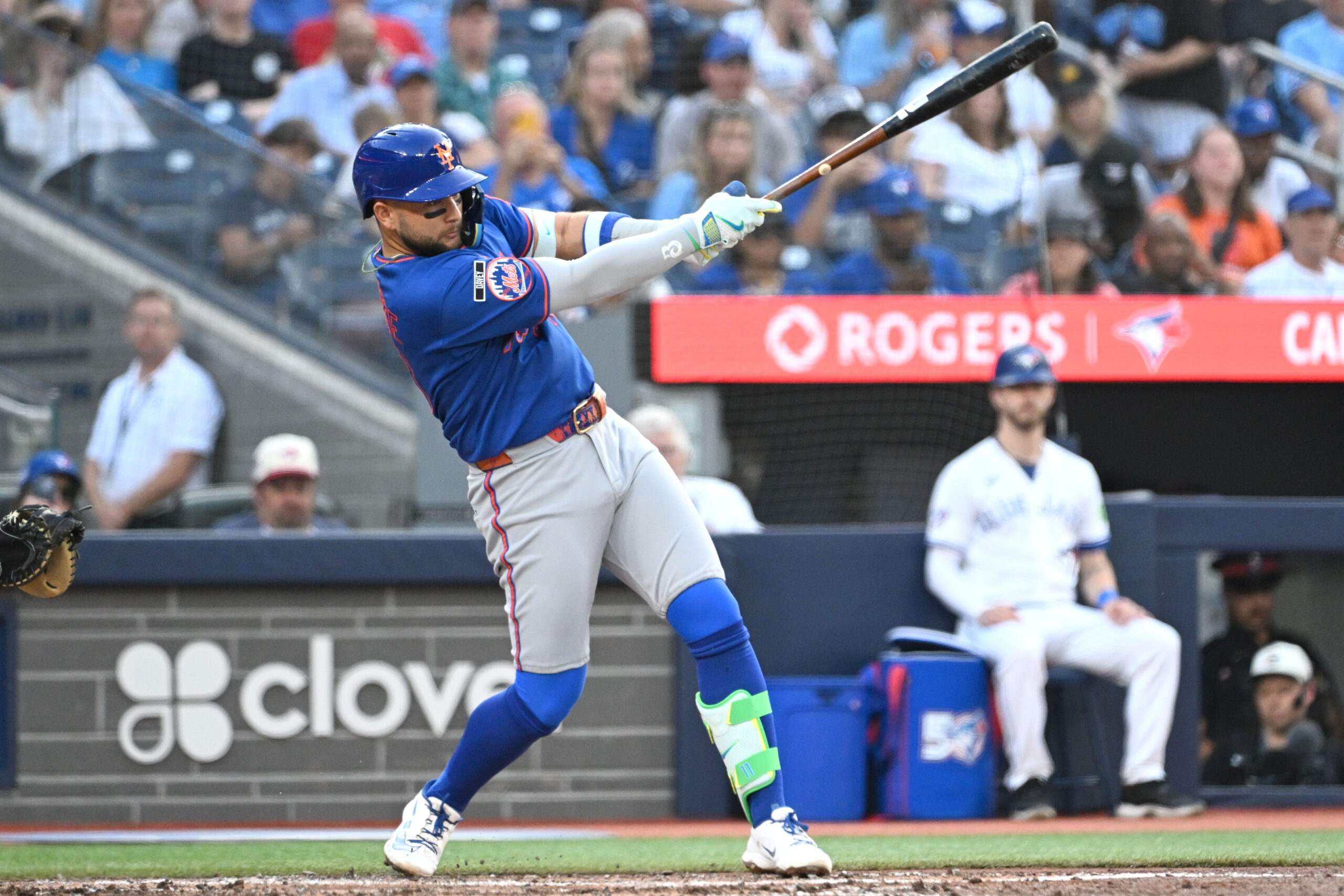 Jun 30, 2026; Toronto, Ontario, CAN;  New York Mets third baseman Bo Bichette (19) hits a single against the Toronto Blue Jays in the third inning at Rogers Centre. Mandatory Credit: Dan Hamilton-Imagn Images