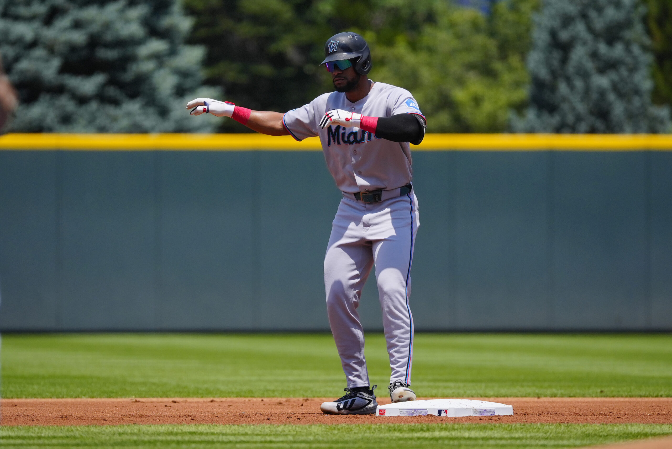 Jul 2, 2026; Denver, Colorado, USA; Miami Marlins shortstop Otto Lopez (6) reacts after his double in the first inning against the Colorado Rockies at Coors Field. Mandatory Credit: Ron Chenoy-Imagn Images