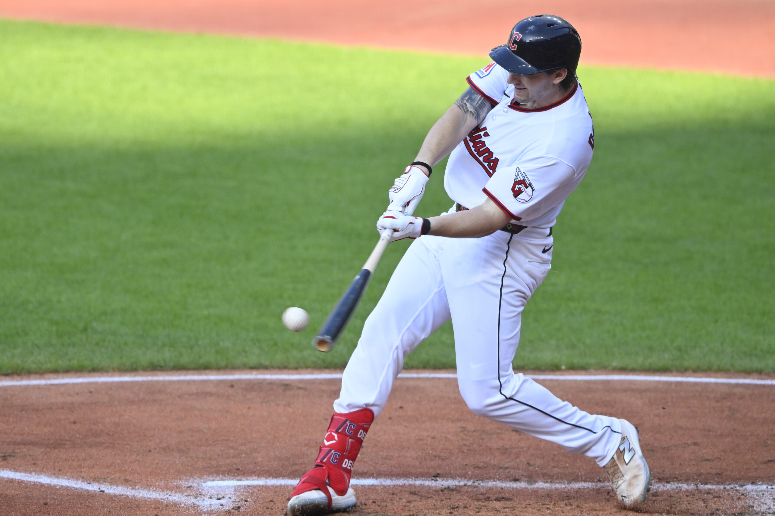 Jul 2, 2026; Cleveland, Ohio, USA; Cleveland Guardians designated hitter Chase DeLauter (24) singles in the first inning against the Chicago White Sox at Progressive Field. Mandatory Credit: David Richard-Imagn Images