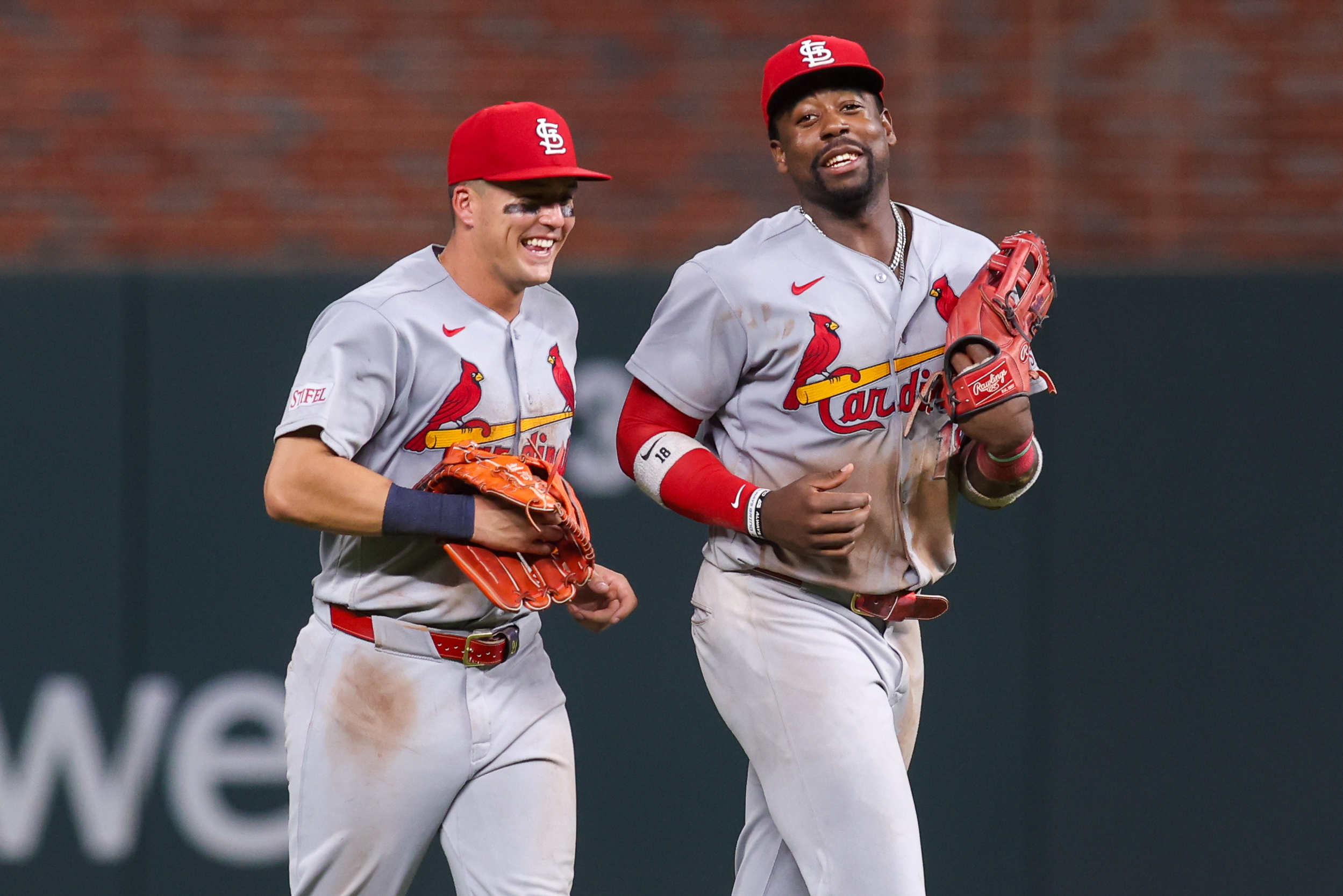 Jul 2, 2026; Atlanta, Georgia, USA; St. Louis Cardinals left fielder Lars Nootbaar (21) and right fielder Jordan Walker (18) celebrate after a victory over the Atlanta Braves at Truist Park. Mandatory Credit: Brett Davis-Imagn Images