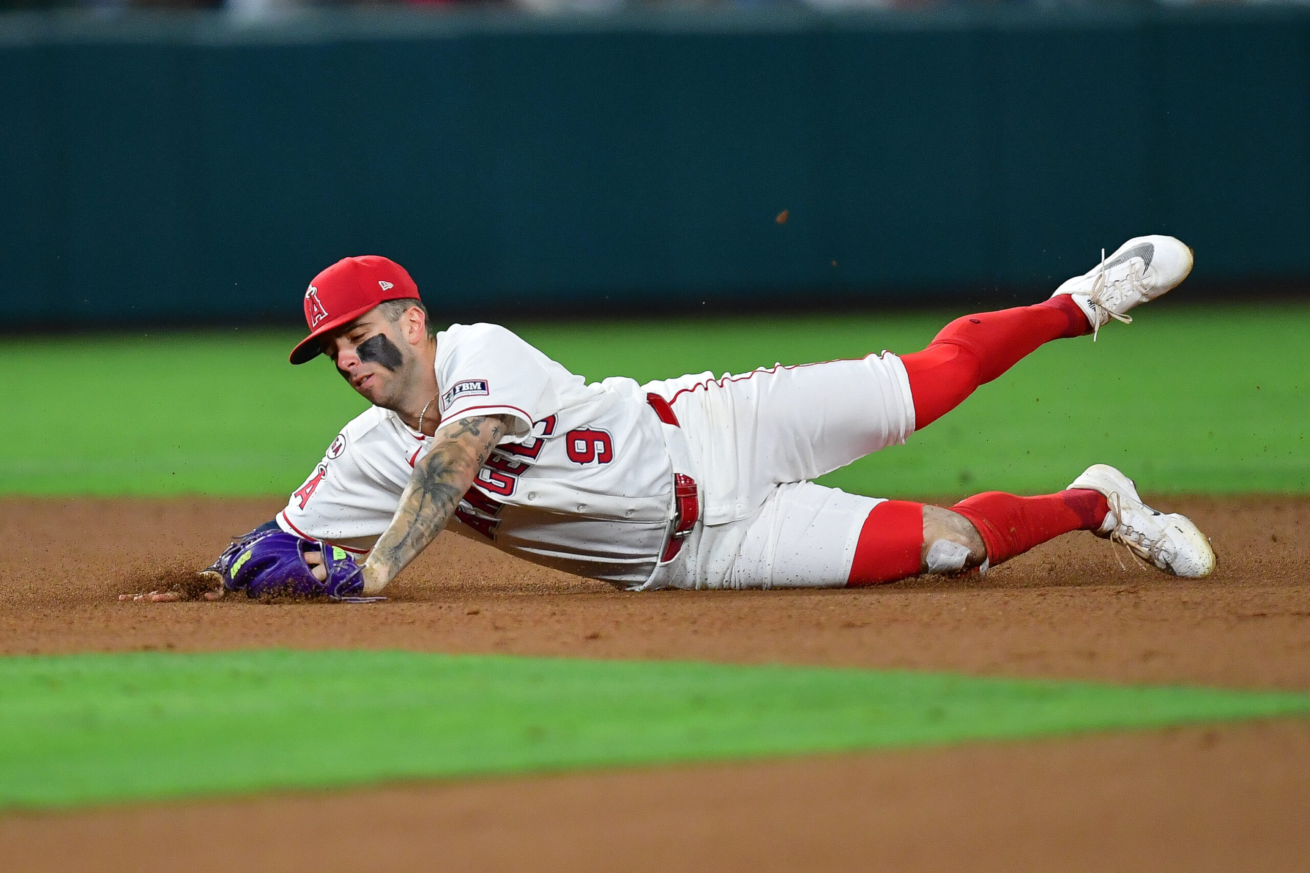 Jul 3, 2026; Anaheim, California, USA; Los Angeles Angels shortstop Zach Neto (9) catches the line drive of Boston Red Sox right fielder Nate Eaton (18) which results in a doulbe play during the eighth inning at Angel Stadium. Mandatory Credit: Gary A. Vasquez-Imagn Images