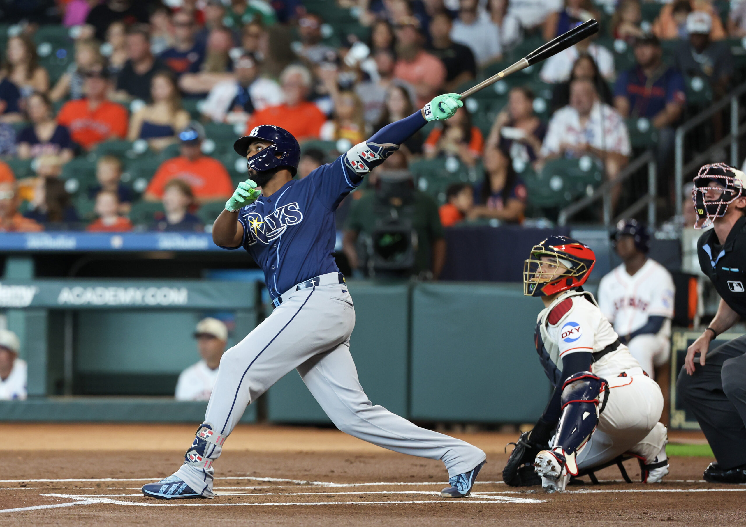 Jul 4, 2026; Houston, Texas, USA; Tampa Bay Rays third baseman Junior Caminero (13) hits a home run against the Houston Astros in the first inning at Daikin Park. Mandatory Credit: Thomas Shea-Imagn Images