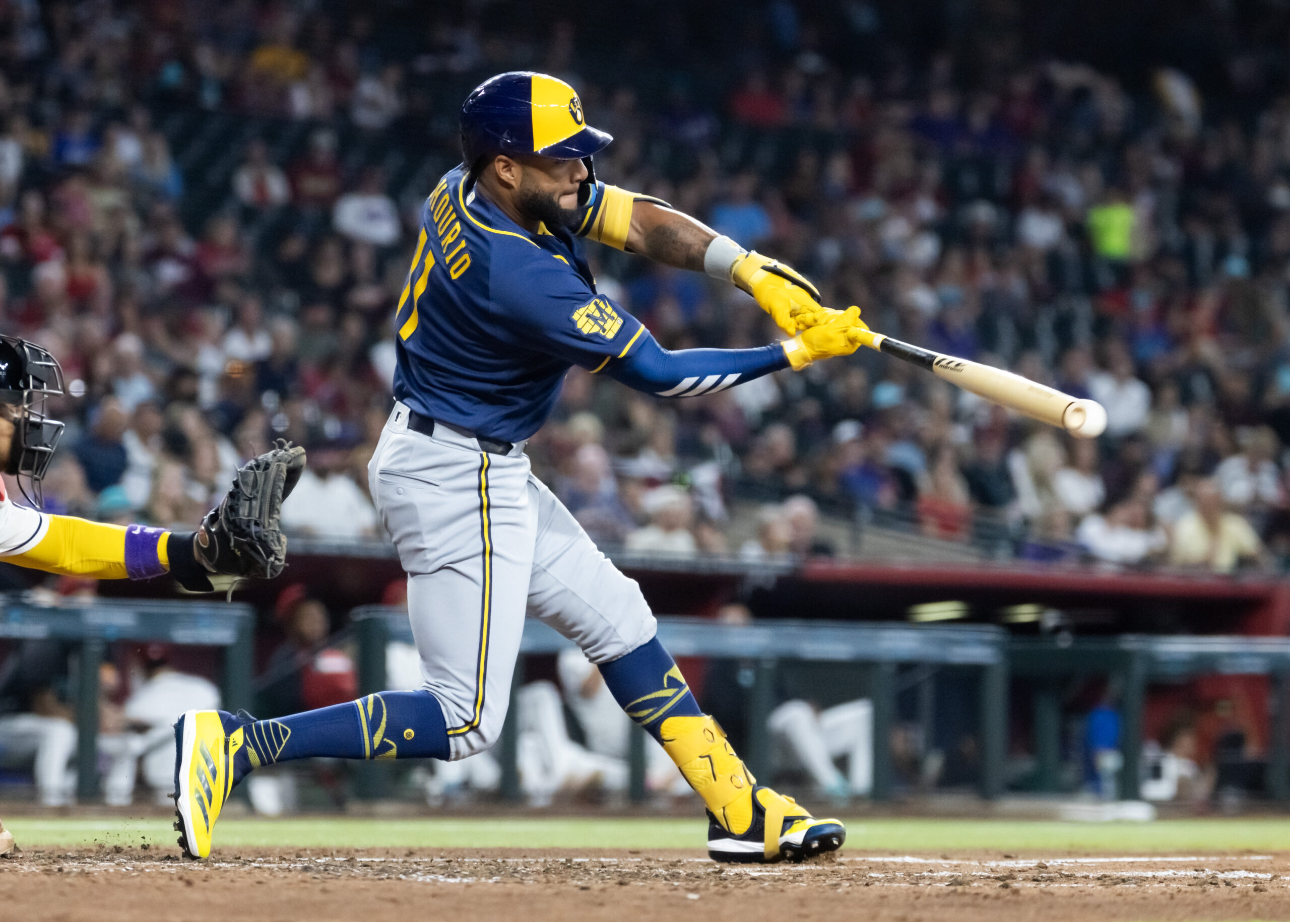 Jul 5, 2026; Phoenix, Arizona, USA; Milwaukee Brewers outfielder Jackson Chourio hits a fourth inning single against the Arizona Diamondbacks at Chase Field. Mandatory Credit: Mark J. Rebilas-Imagn Images