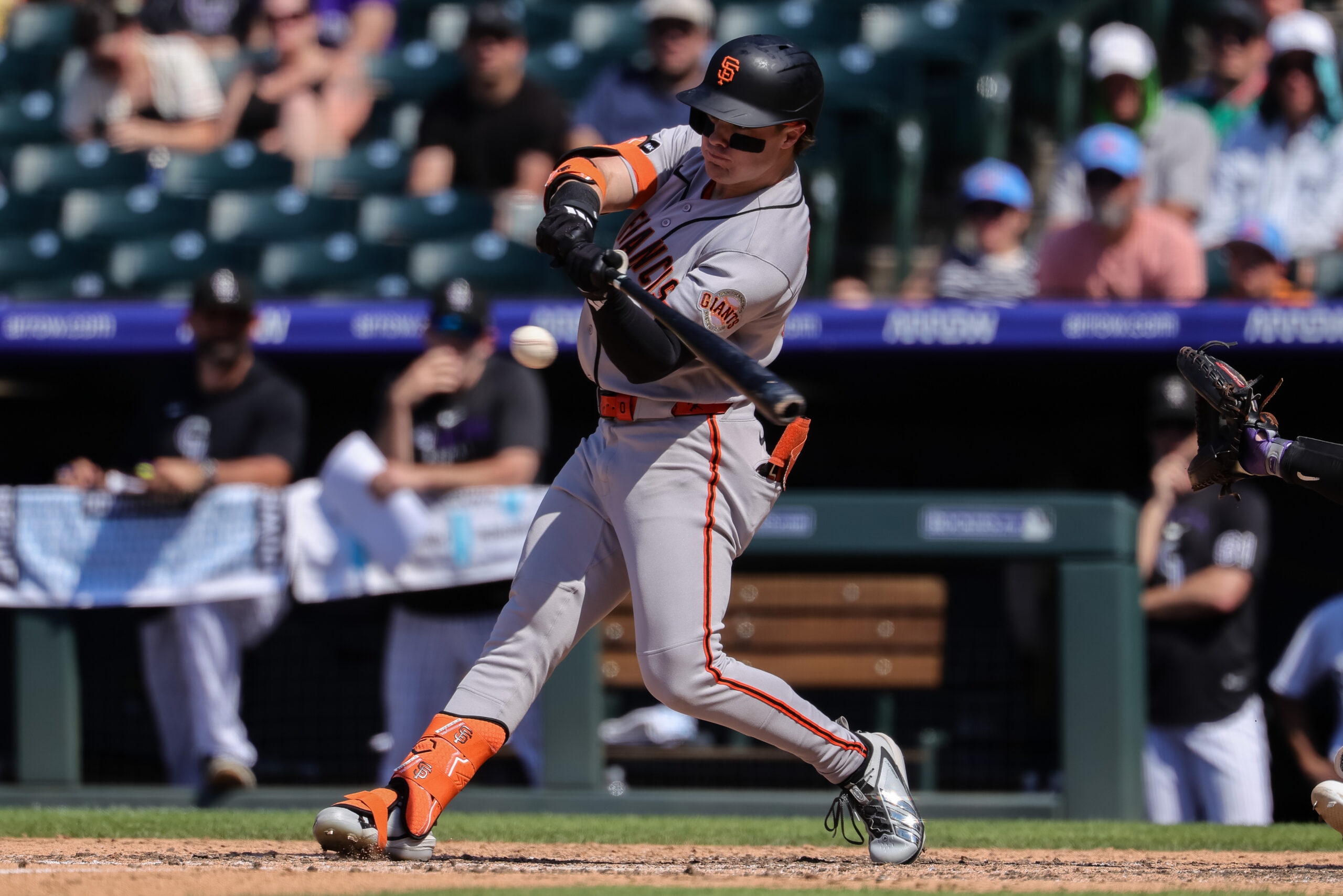 Jul 5, 2026; Denver, Colorado, USA; San Francisco Giants center fielder Drew Gilbert (0) hits an RBI single in the sixth inning against the Colorado Rockies at Coors Field. Mandatory Credit: Isaiah J. Downing-Imagn Images