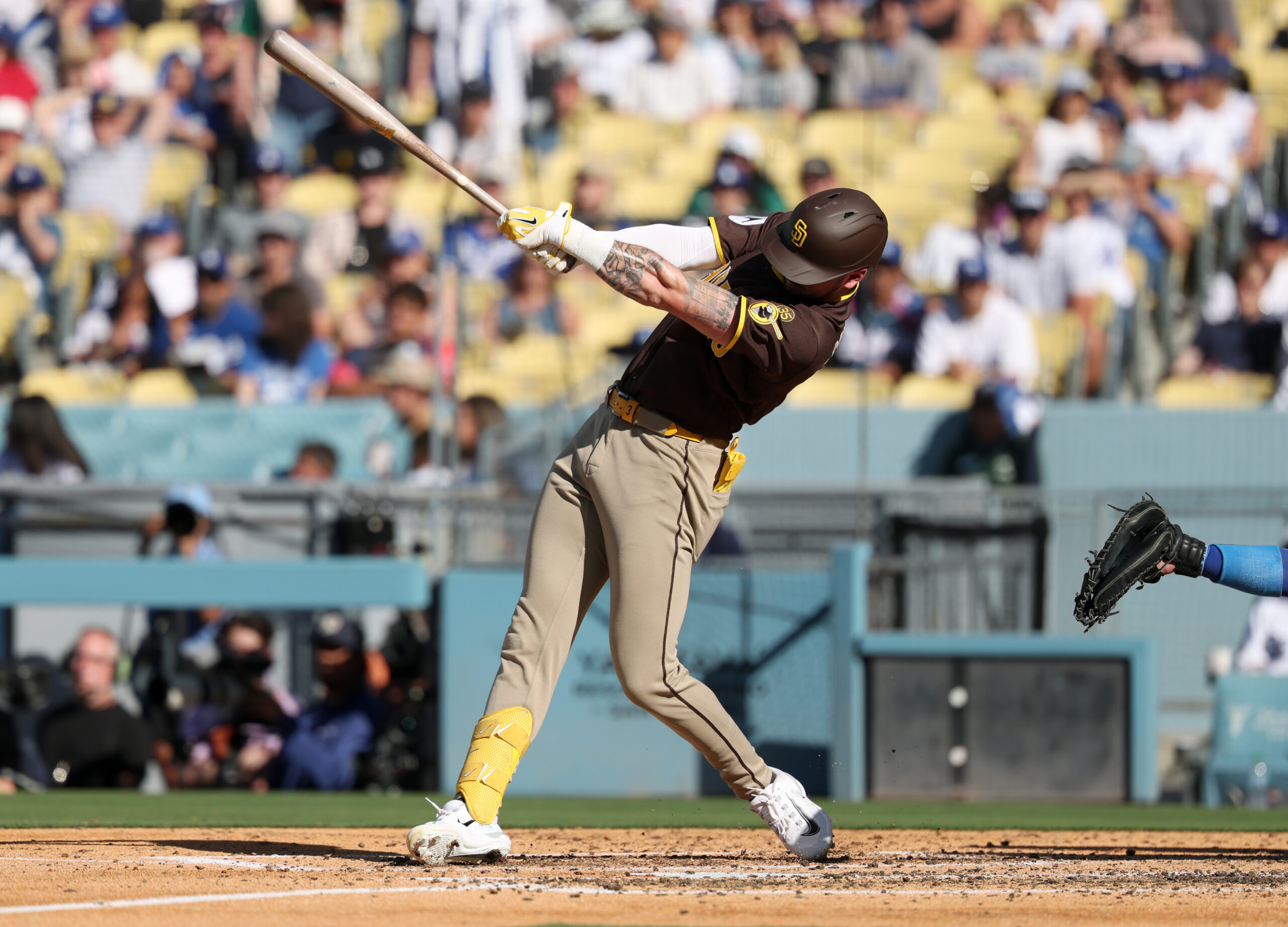 Jul 5, 2026; Los Angeles, California, USA; San Diego Padres center fielder Jackson Merrill (3) hits a RBI single in the fourth inning against the Los Angeles Dodgers at Dodger Stadium. Mandatory Credit: Kiyoshi Mio-Imagn Images