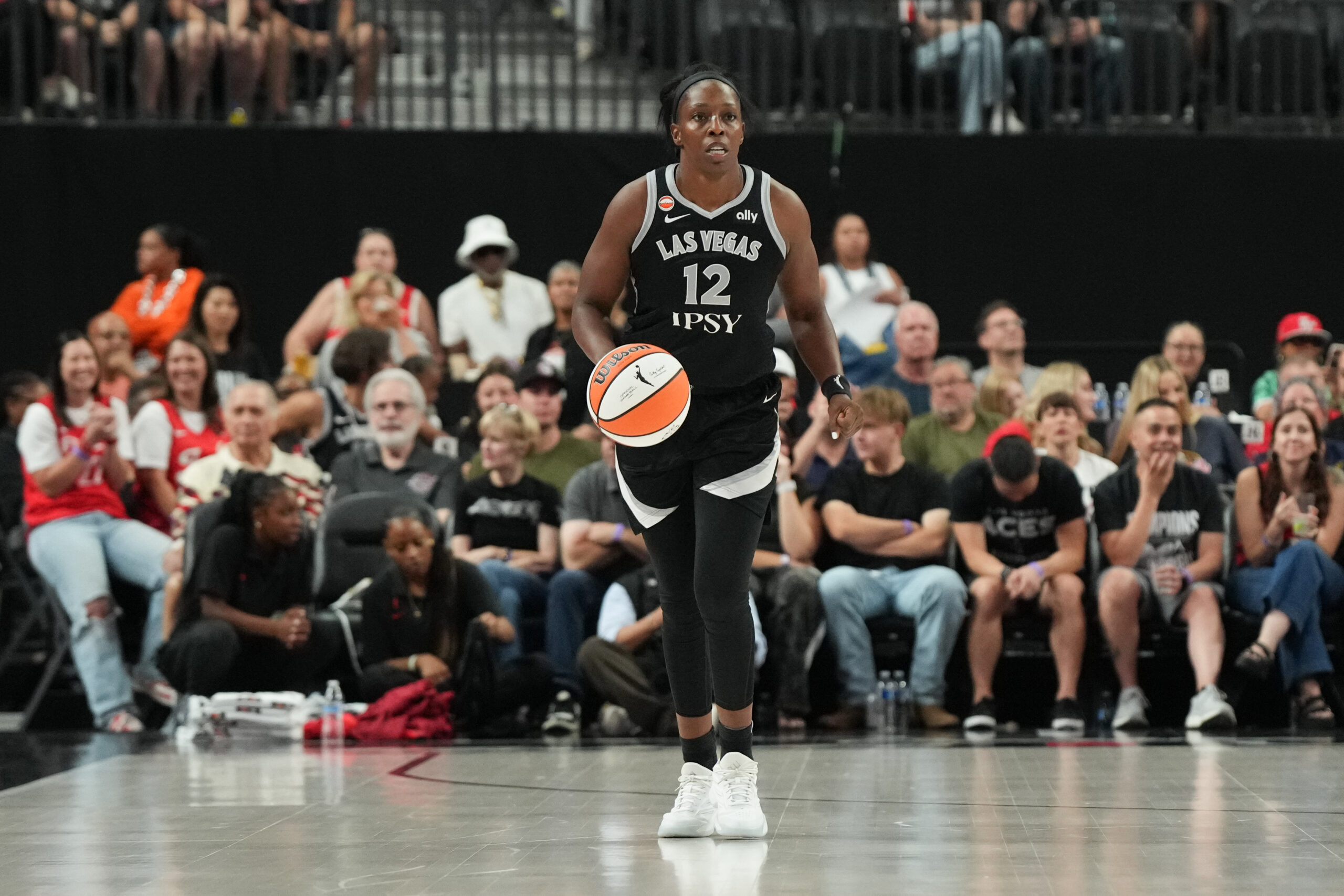 Jul 5, 2026; Las Vegas, Nevada, USA; Las Vegas Aces guard Chelsea Gray (12) dribbles against against the Indiana Fever in the first quarter of their game at T-Mobile Arena. Mandatory Credit: Candice Ward-Imagn Images