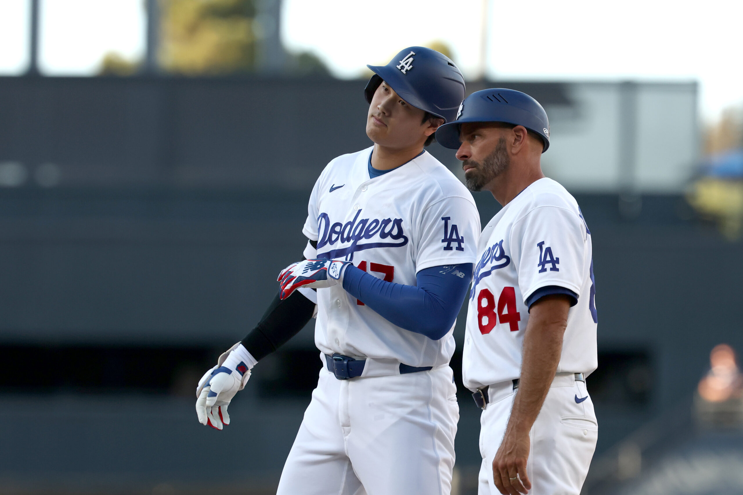 Jul 5, 2026; Los Angeles, California, USA; Los Angeles Dodgers designated hitter Shohei Ohtani (17) reacts at first base after hitting a 2-RBI single in the seventh inning against the San Diego Padres at Dodger Stadium. Mandatory Credit: Kiyoshi Mio-Imagn Images