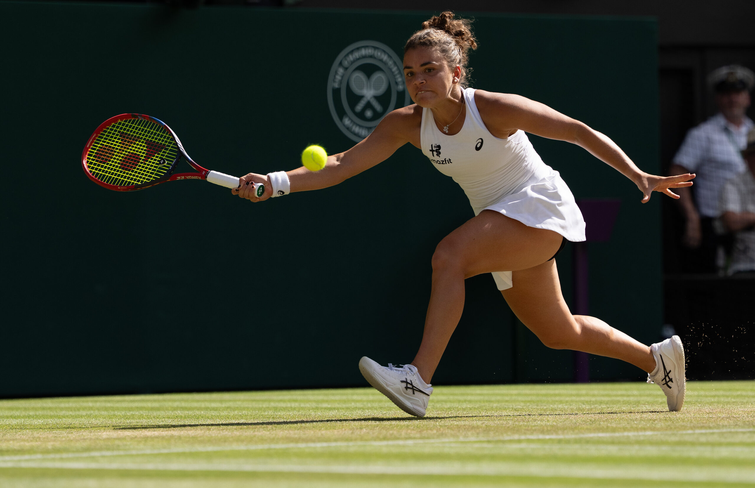Jul 6 2026; London, United Kingdom; Jasmine Paolini of Italy returns a shot during her match against Alexandra Eala of the Philippines on day eight at All England Lawn Tennis and Croquet Club.  Mandatory Credit: Susan Mullane-Imagn Images