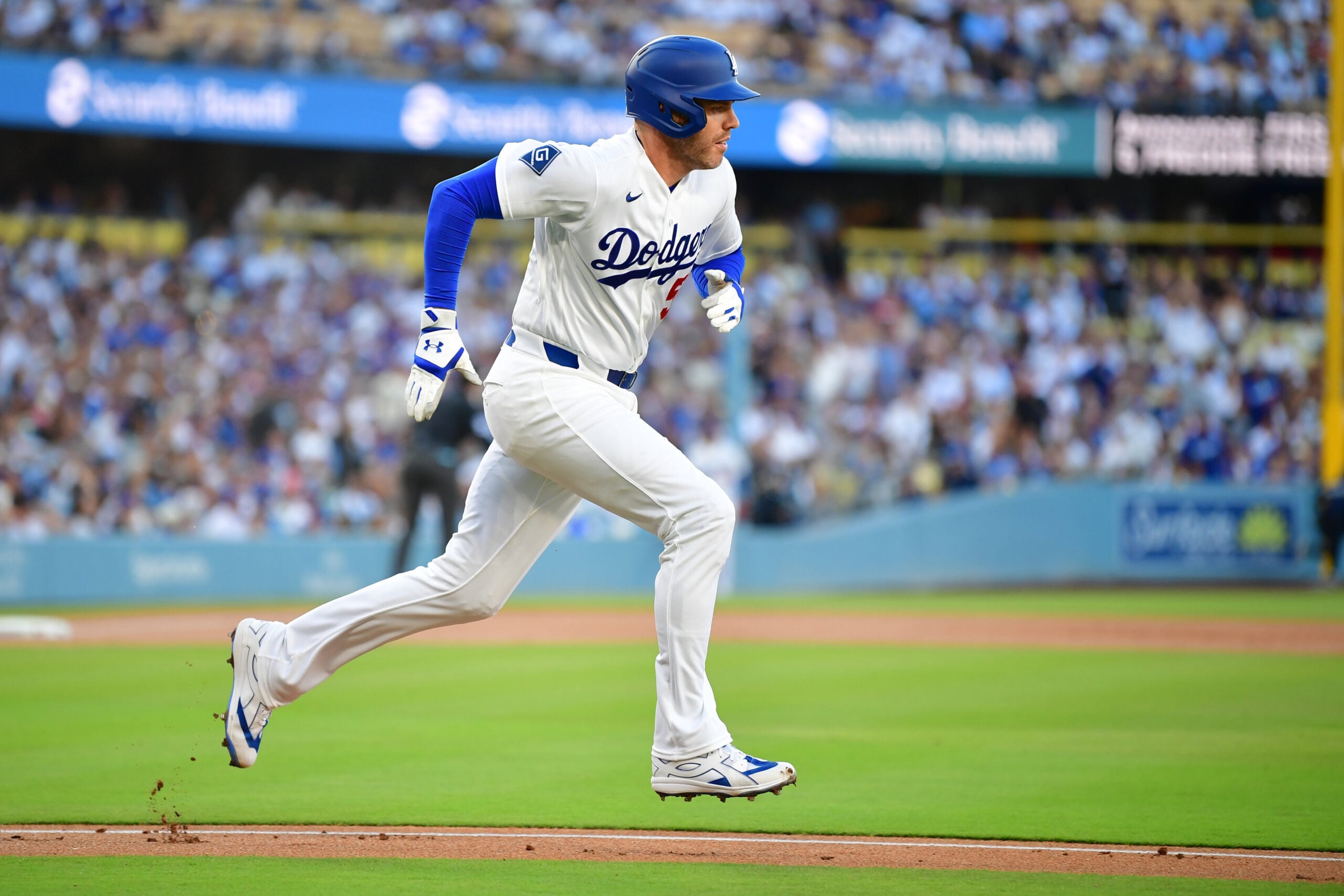 Jul 8, 2026; Los Angeles, California, USA; Los Angeles Dodgers first baseman Freddie Freeman (5) runs to first base after hitting a double in the first inning against the Colorado Rockies at Dodger Stadium. Mandatory Credit: Gary A. Vasquez-Imagn Images