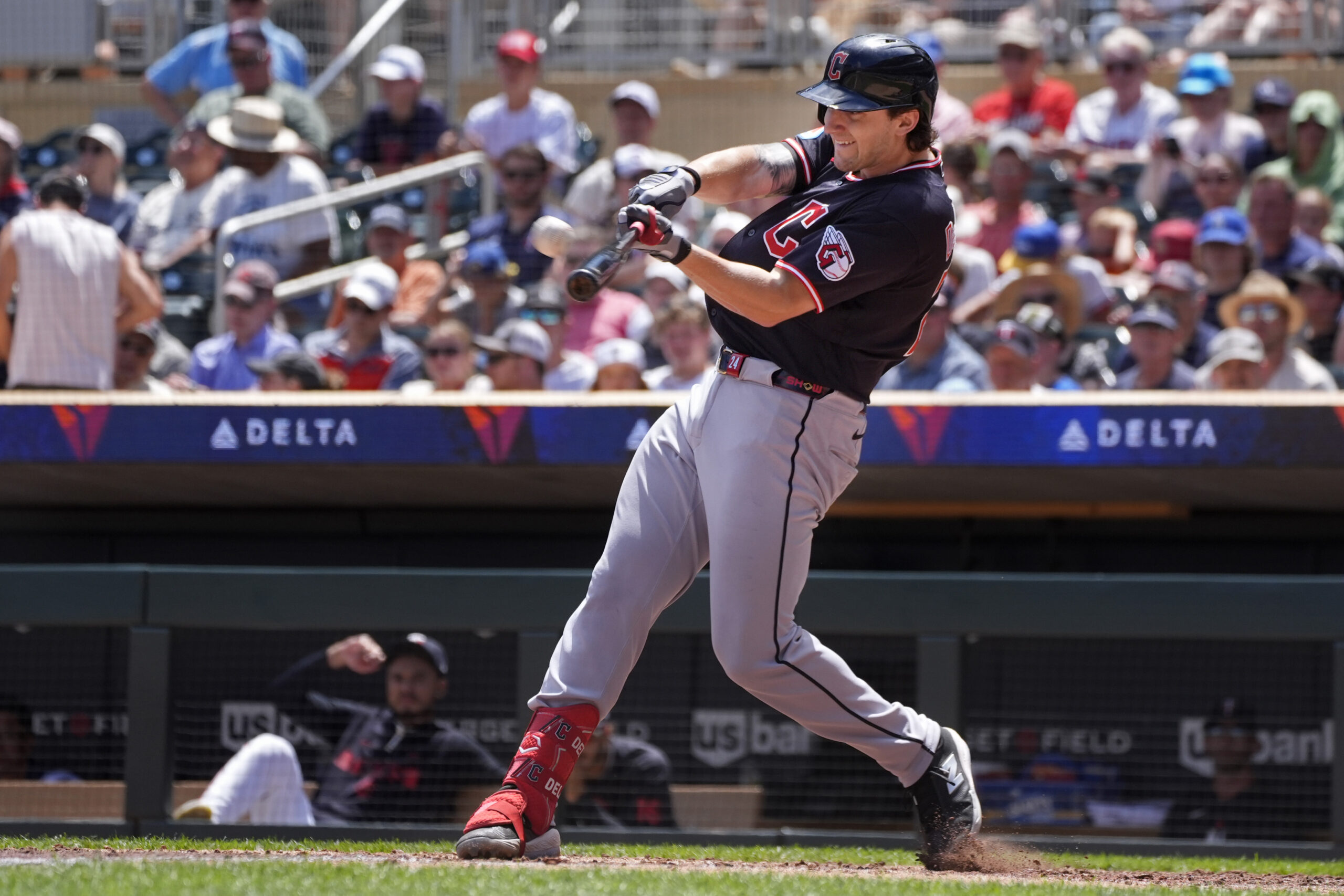 Jul 9, 2026; Minneapolis, Minnesota, USA; Cleveland Guardians designated hitter Chase DeLauter (24) hits a solo home run against the Minnesota Twins in the sixth inning at Target Field. Mandatory Credit: Bruce Kluckhohn-Imagn Images
