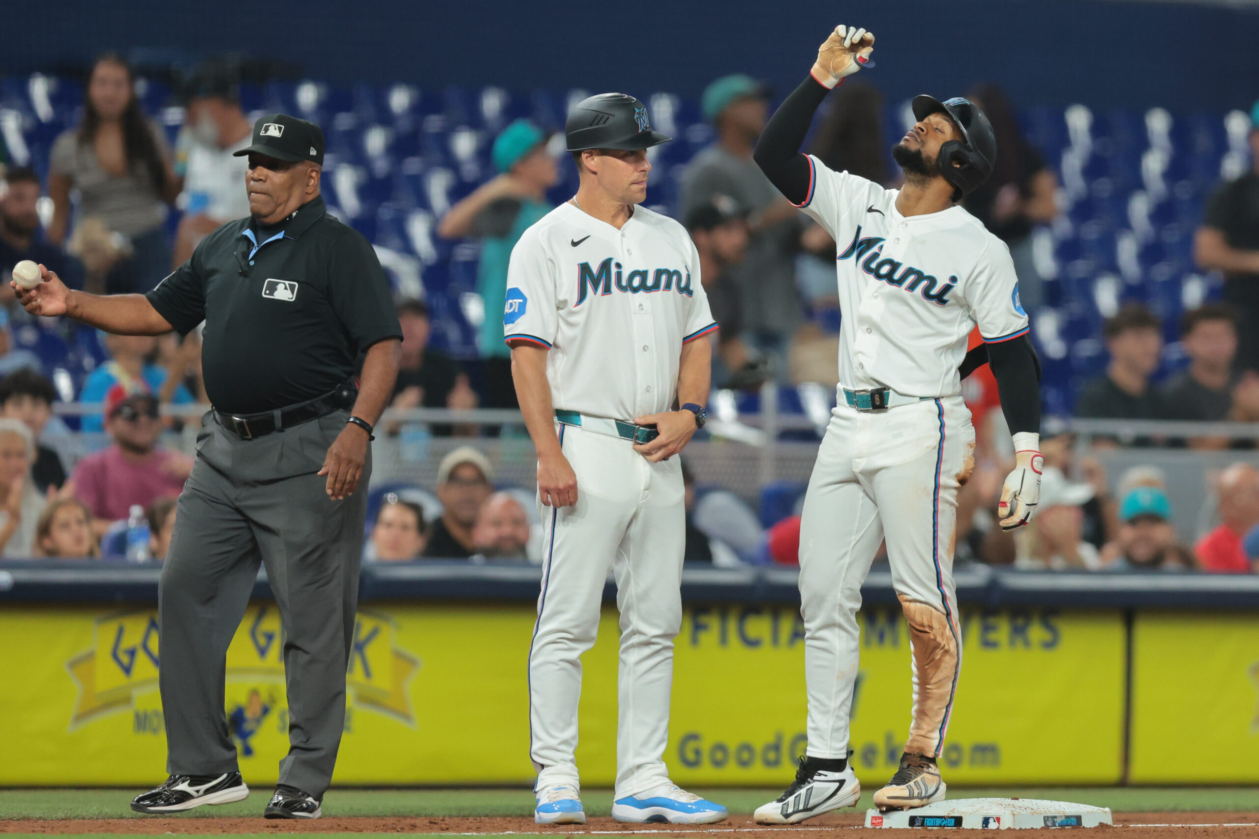 Jul 9, 2026; Miami, Florida, USA; Miami Marlins shortstop Otto Lopez (6) reacts from third base after hitting a two-run triple against the Seattle Mariners during the fourth inning at loanDepot Park. Mandatory Credit: Sam Navarro-Imagn Images