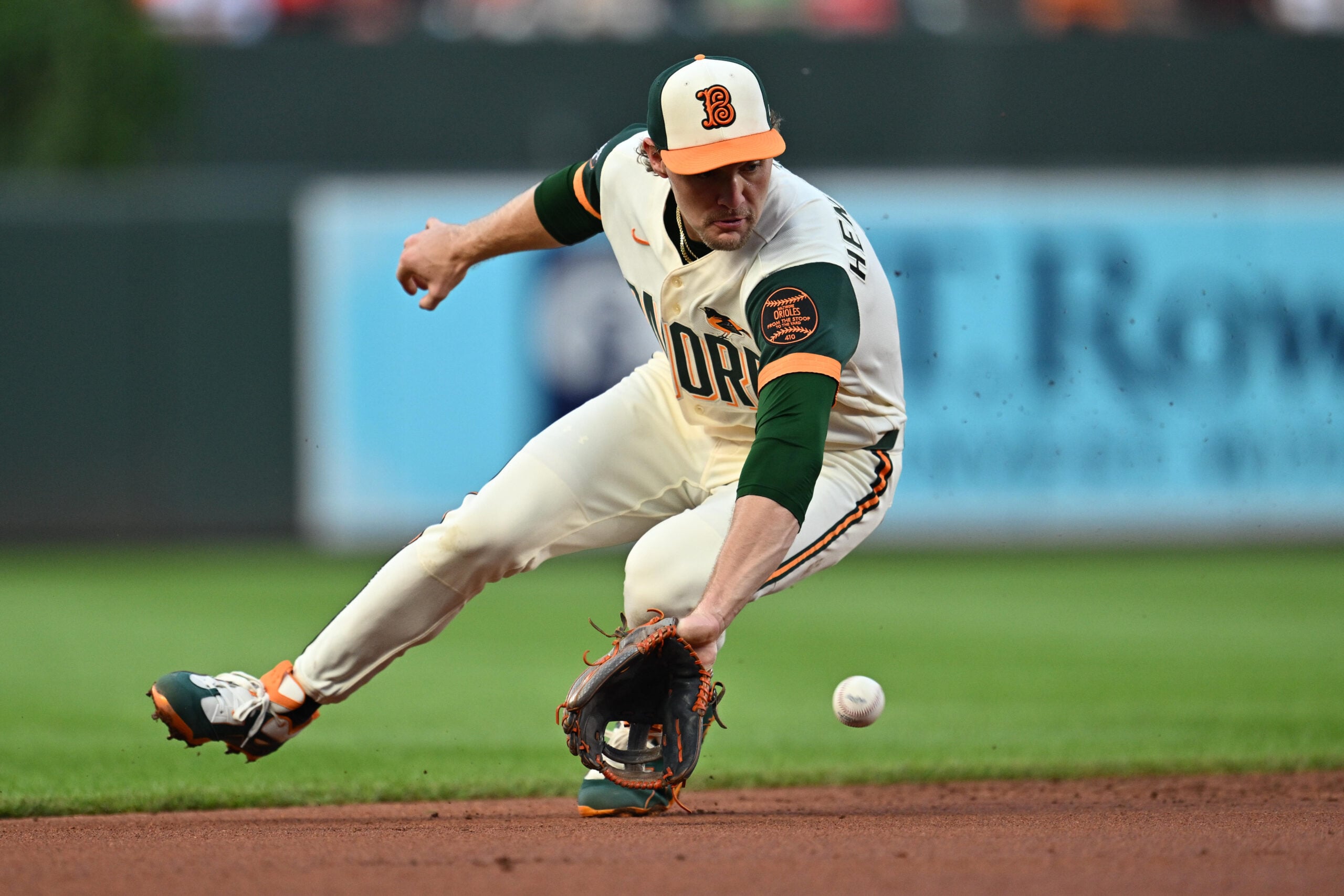 Jul 10, 2026; Baltimore, Maryland, USA; Baltimore Orioles infielder Gunnar Henderson (2) chases down a ground ball to start a double play in the second inning against the Kansas City Royals at Oriole Park at Camden Yards. Mandatory Credit: Jamie Sabau-Imagn Images