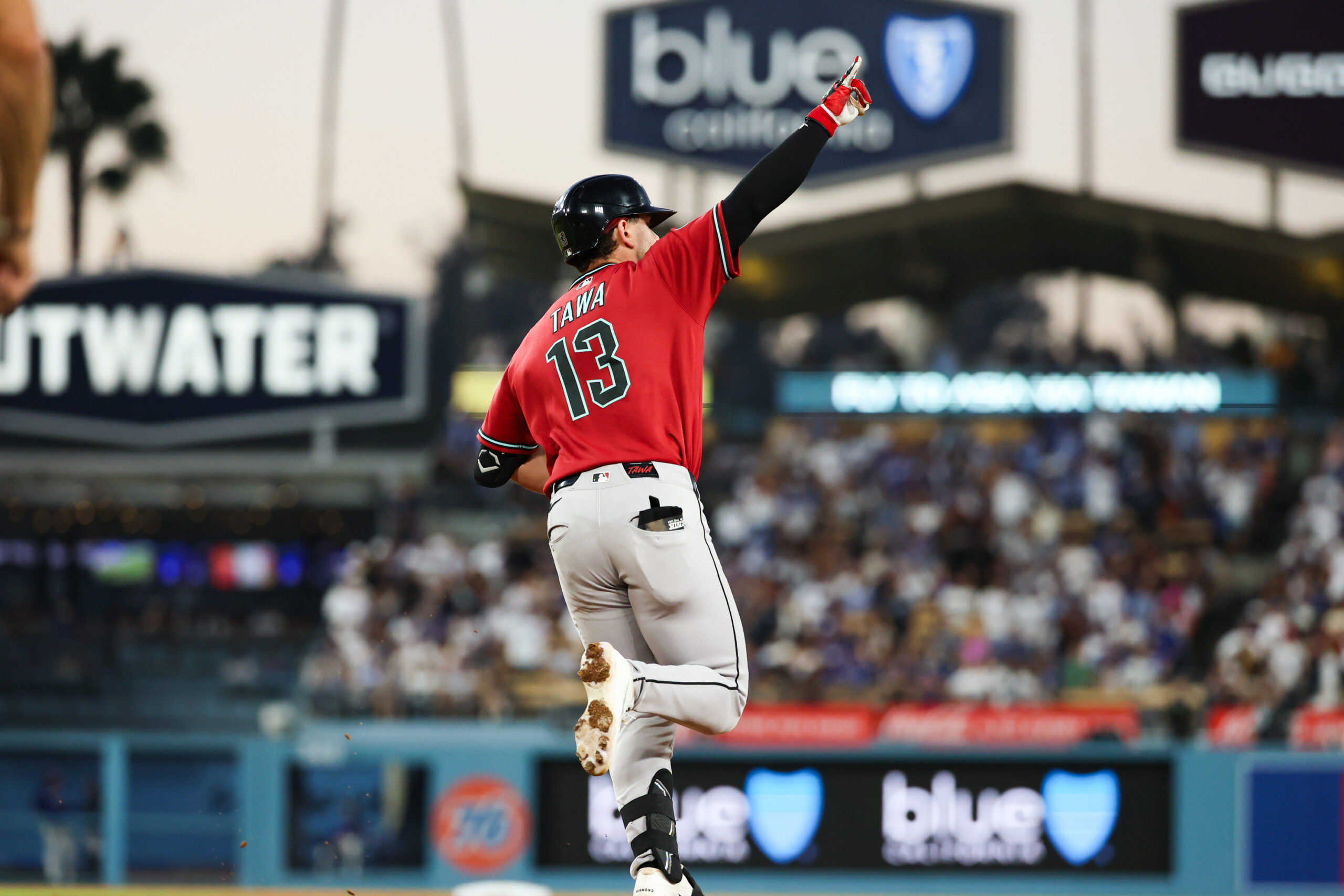 Jul 2, 2026; Los Angeles, California, USA;  Arizona Diamondbacks left fielder Tim Tawa (13) round the bases after a home run at the top of the fourth inning against the Los Angeles Dodgers at Dodger Stadium. Mandatory Credit: William Navarro-Imagn Images