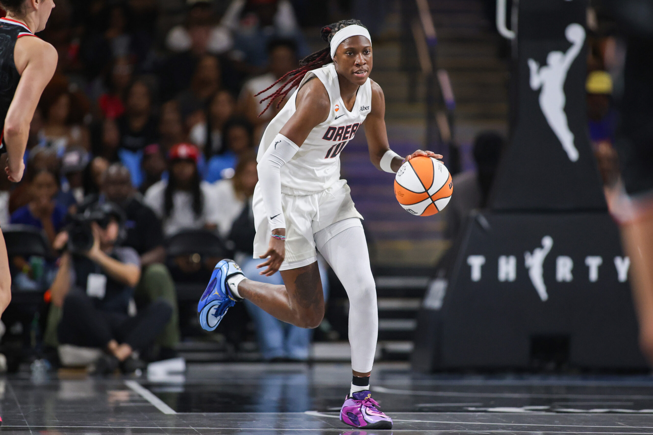 Jul 11, 2026; College Park, Georgia, USA; Atlanta Dream guard Rhyne Howard (10) dribbles against the Portland Fire in the first quarter at Gateway Center Arena at College Park. Mandatory Credit: Brett Davis-Imagn Images